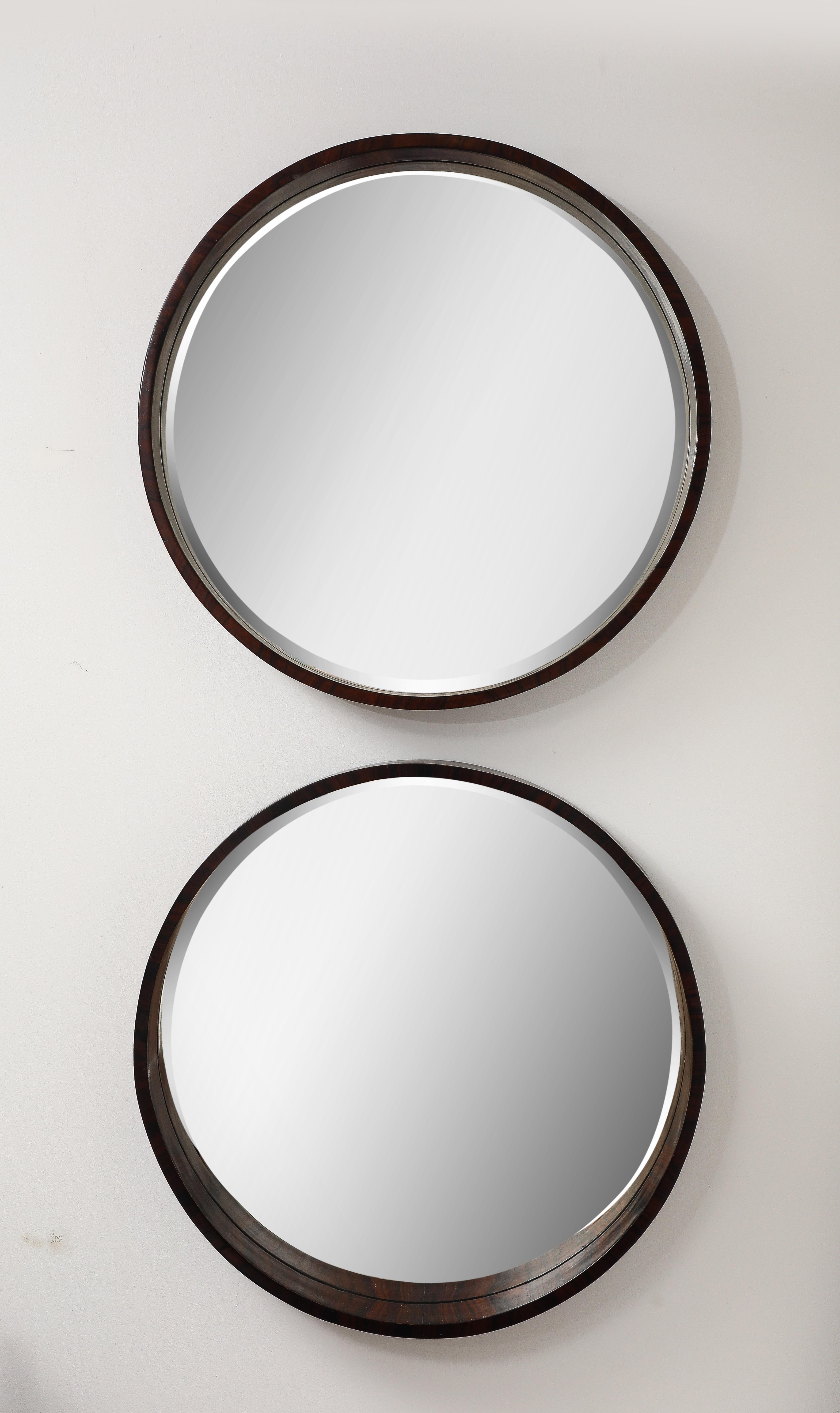 Pair of Mid-Century Modern Wooden Wall Mirrors by Brazilian Designer, 1960s

This pair of Mid-Century Modern solid wood mirrors are made from high-quality solid wood, giving them a sturdy frame.

What sets these mirrors apart from other common