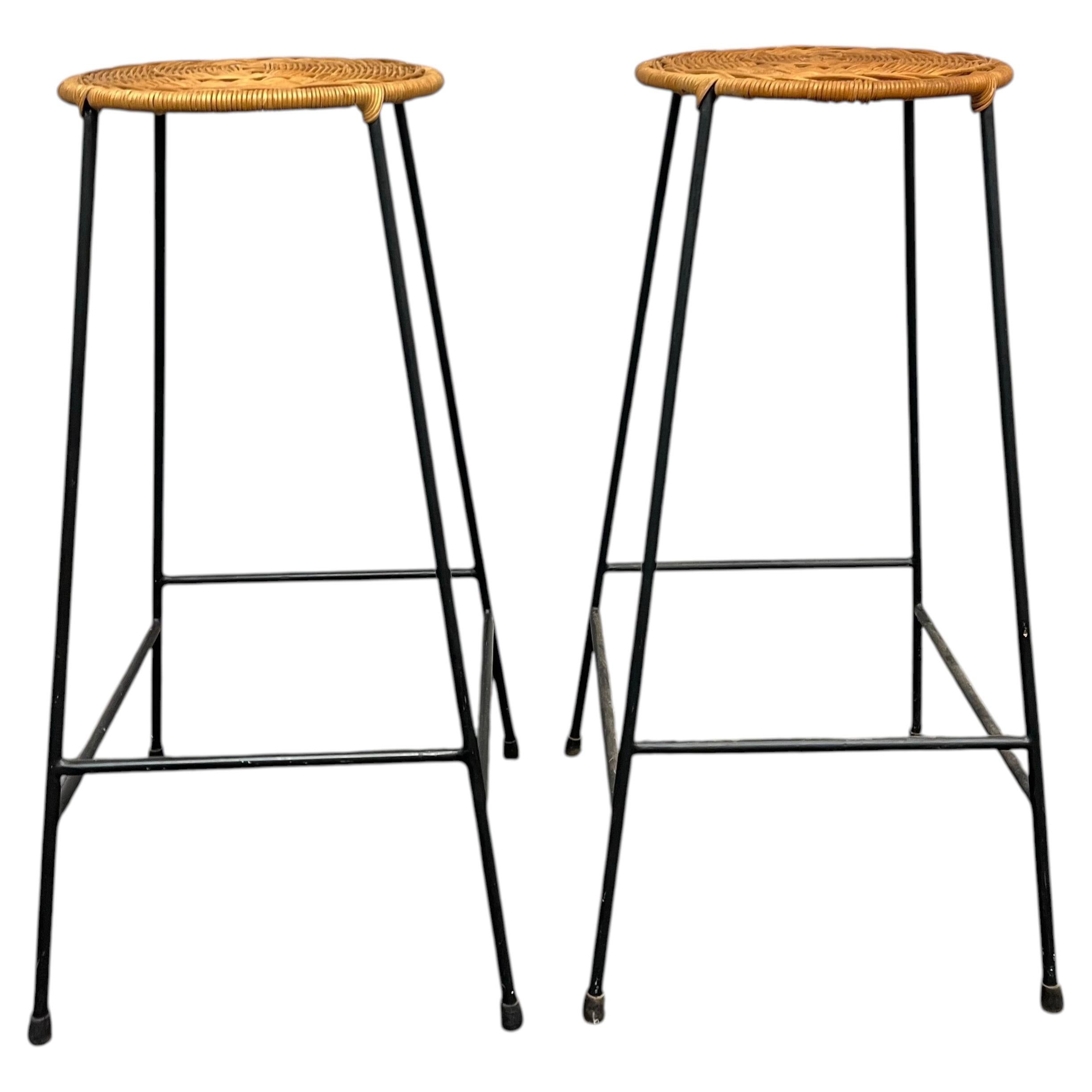 Pair of Mid-Century Modern Woven Rattan and Black Iron Bar or Counter Stools
