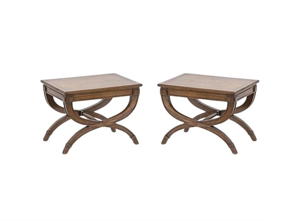 This refined pair of Mid-Century Modern benches or drinks tables were realized in the Unites States, circa 1960 by Drexel. Each bench has a rectangle shape to the top/seat that perfectly complements the elaborate shape of the superb 