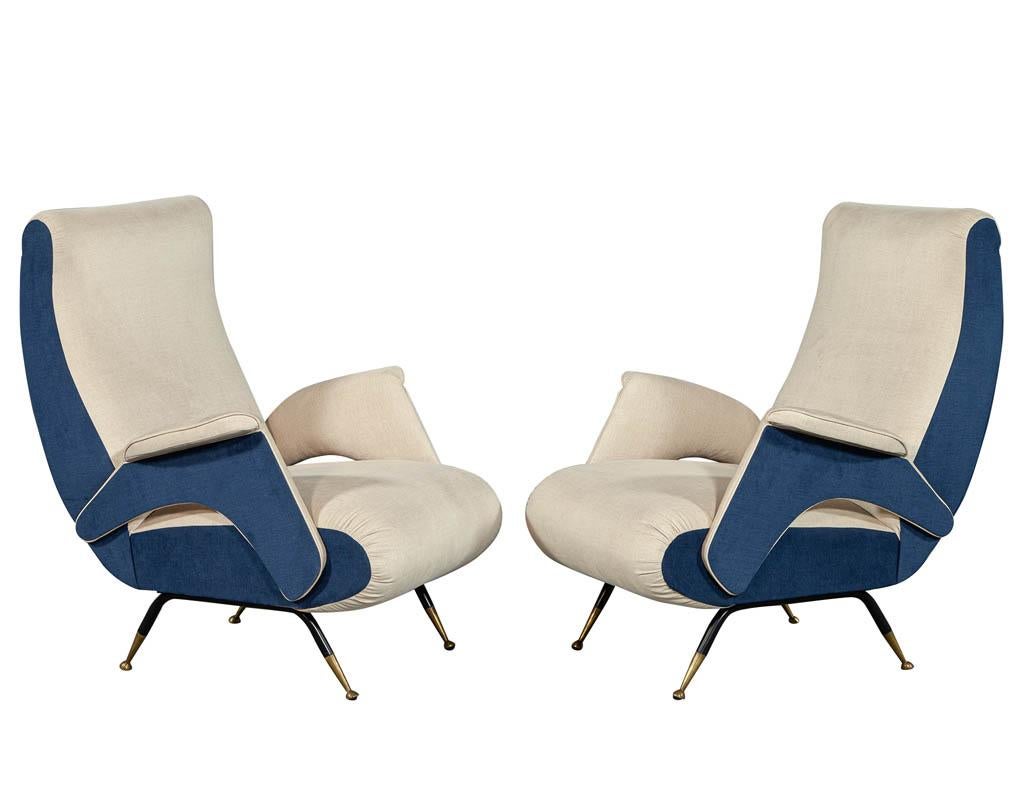 Pair of Mid-Century Modern Zanuso style lounge chairs. Featured in a blue and beige fabric.

Price includes complimentary curb side delivery to the continental USA.