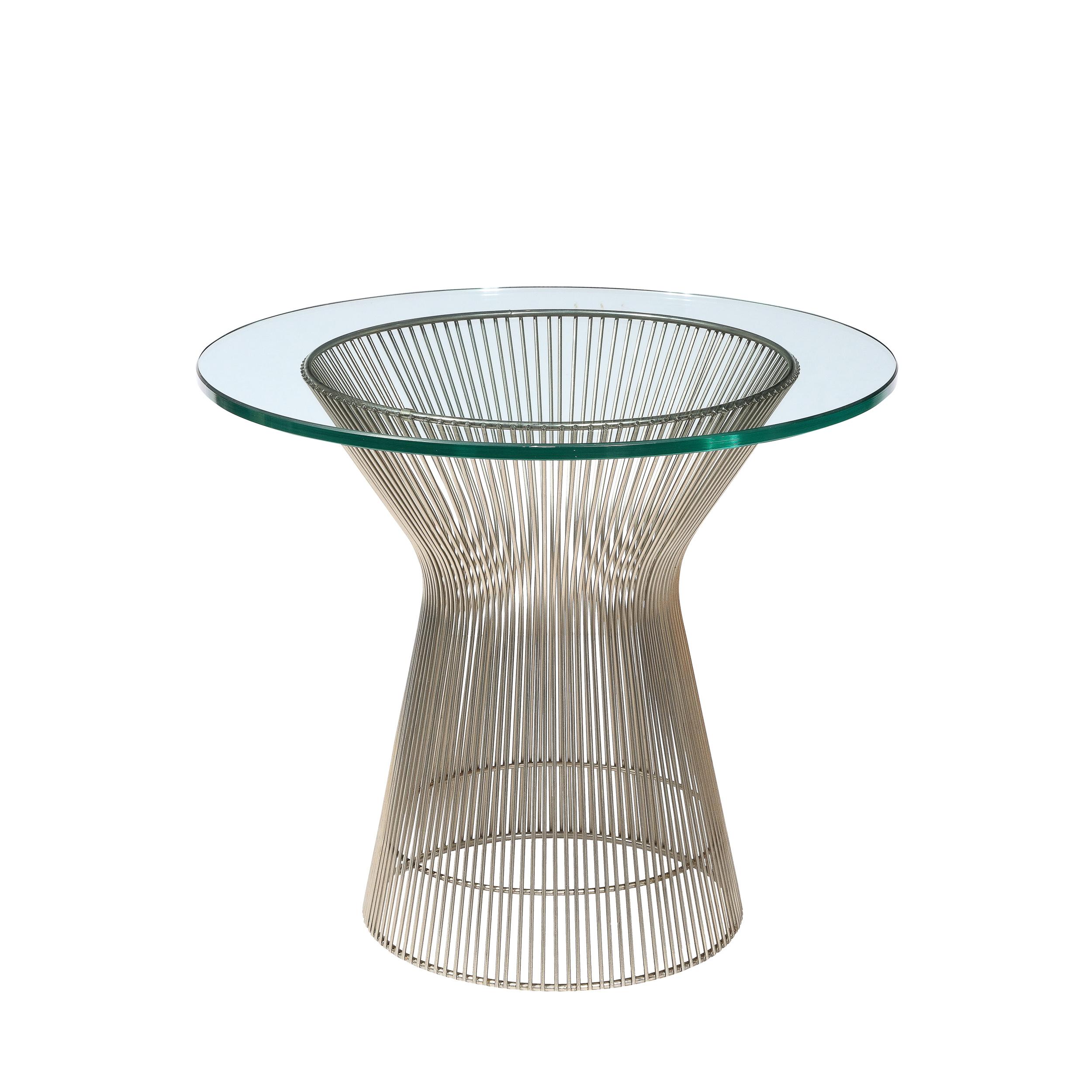 These Bent and Polished Nickel side Tables designed by Warren Platner originate from the United States, Circa 1970. Featuring an hourglass form in a series of parallel nickel cylinders, their geometric minimalist construction is characteristic of