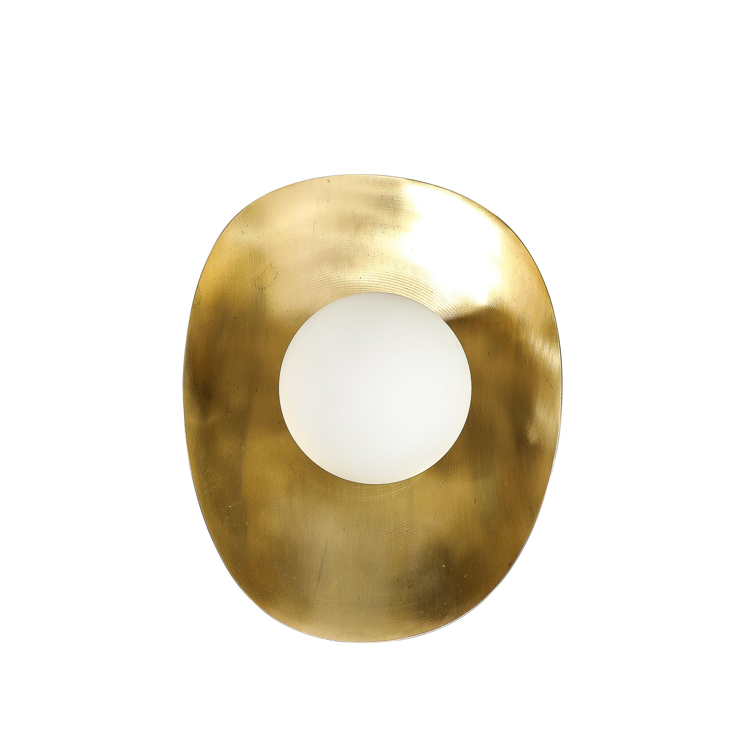 Pair of Mid-Century Modernist Shield Form Brushed Brass & Frosted Glass Sconces In Excellent Condition In New York, NY