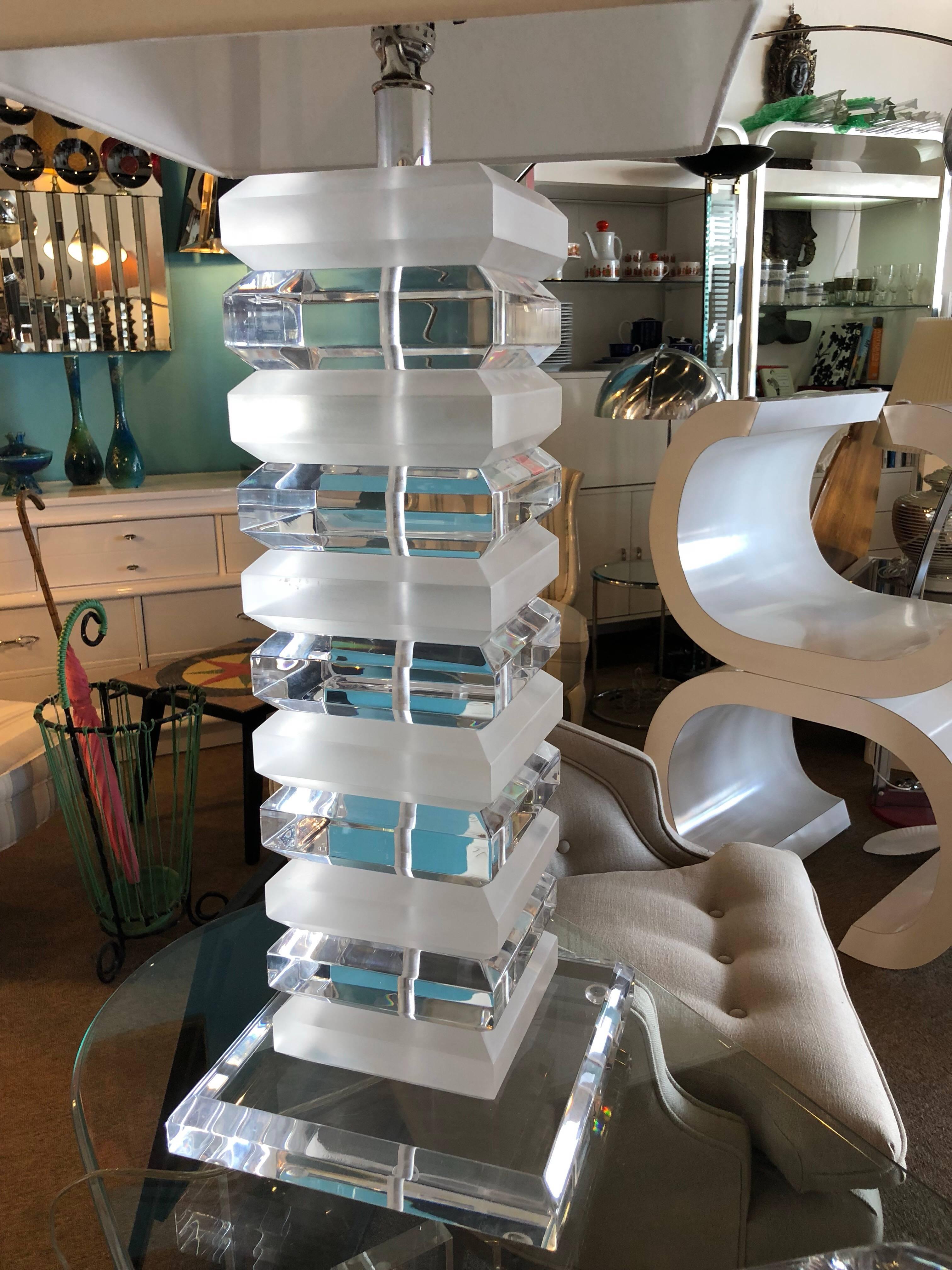 Charles Hollis Jones style, these 1970s stunning tall and very heavy stacked Lucite Table Lamps will bring to your living room or bedroom a touch of glamour and elegance. 
Each lamp weighs almost 40 pounds / 18 kilograms
Lucite/Acrylic is