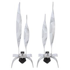 Pair of Mid-Century Modernist Torqued Flame Andirons in Polished Chrome