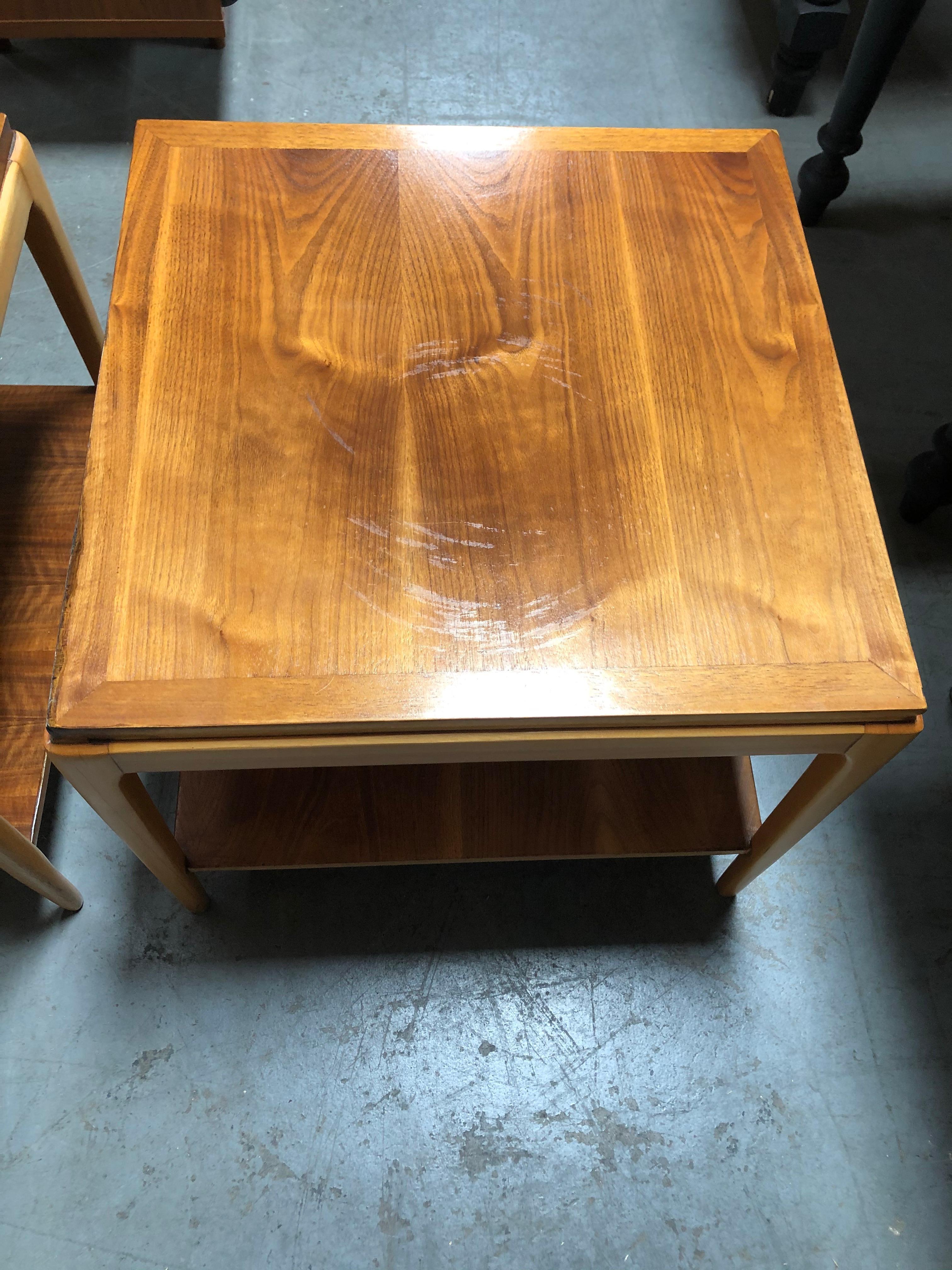 Pair of vintage Mid-Century Modern wood end tables or bedside tables each table has a lower shelf.