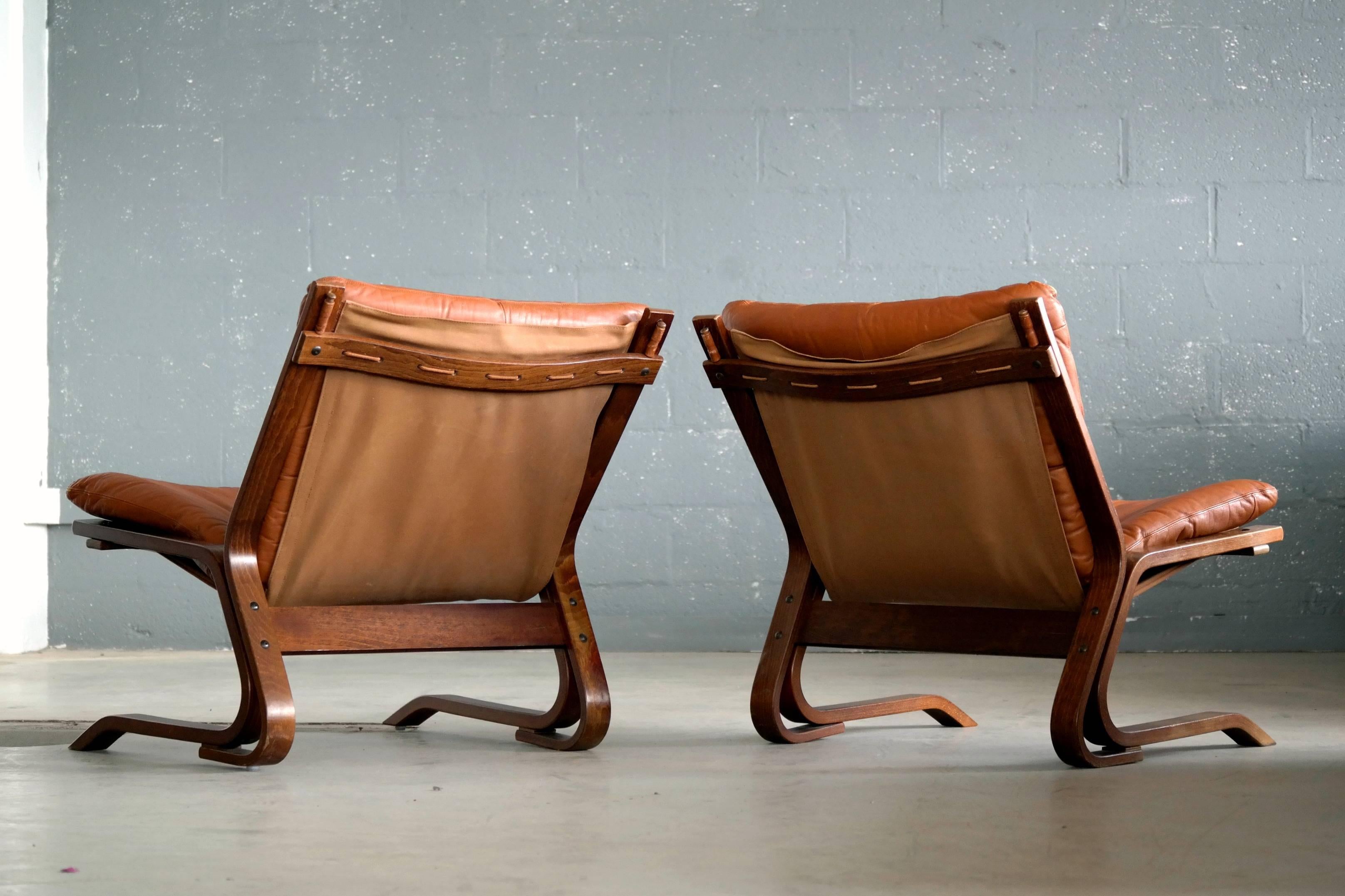 Pair of Midcentury Norwegian Easy Chairs in Cognac Leather by Oddvin Rykken In Excellent Condition In Bridgeport, CT