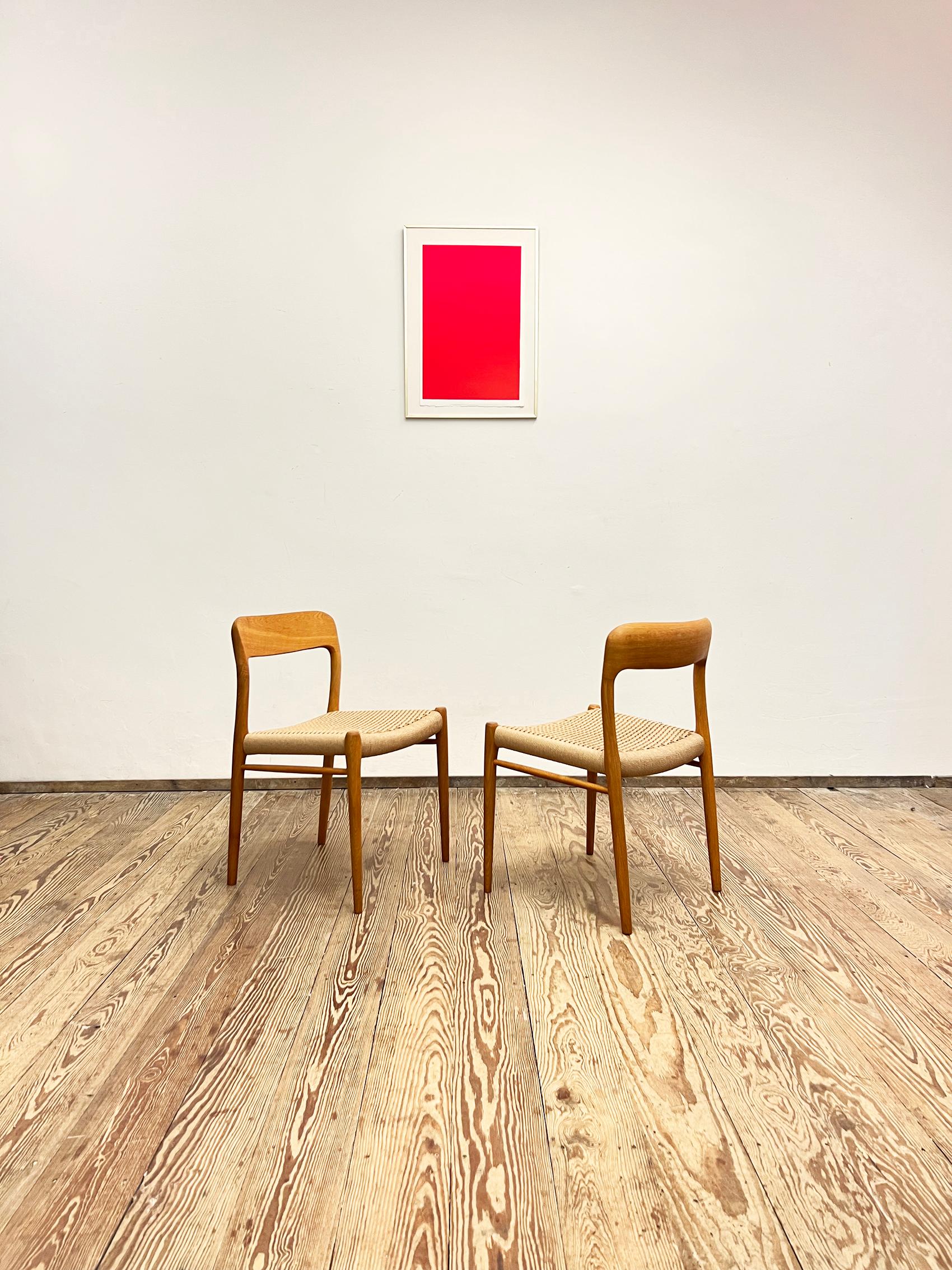 Original set of two dining chairs designed by Niels O. Møller and produced by J.L. Møllers Møbelfabrik, Denmark. First introduced in 1954, Model 75 is one of Møller’s most minimalist designs – compact, elegant, and precisely proportioned. With its