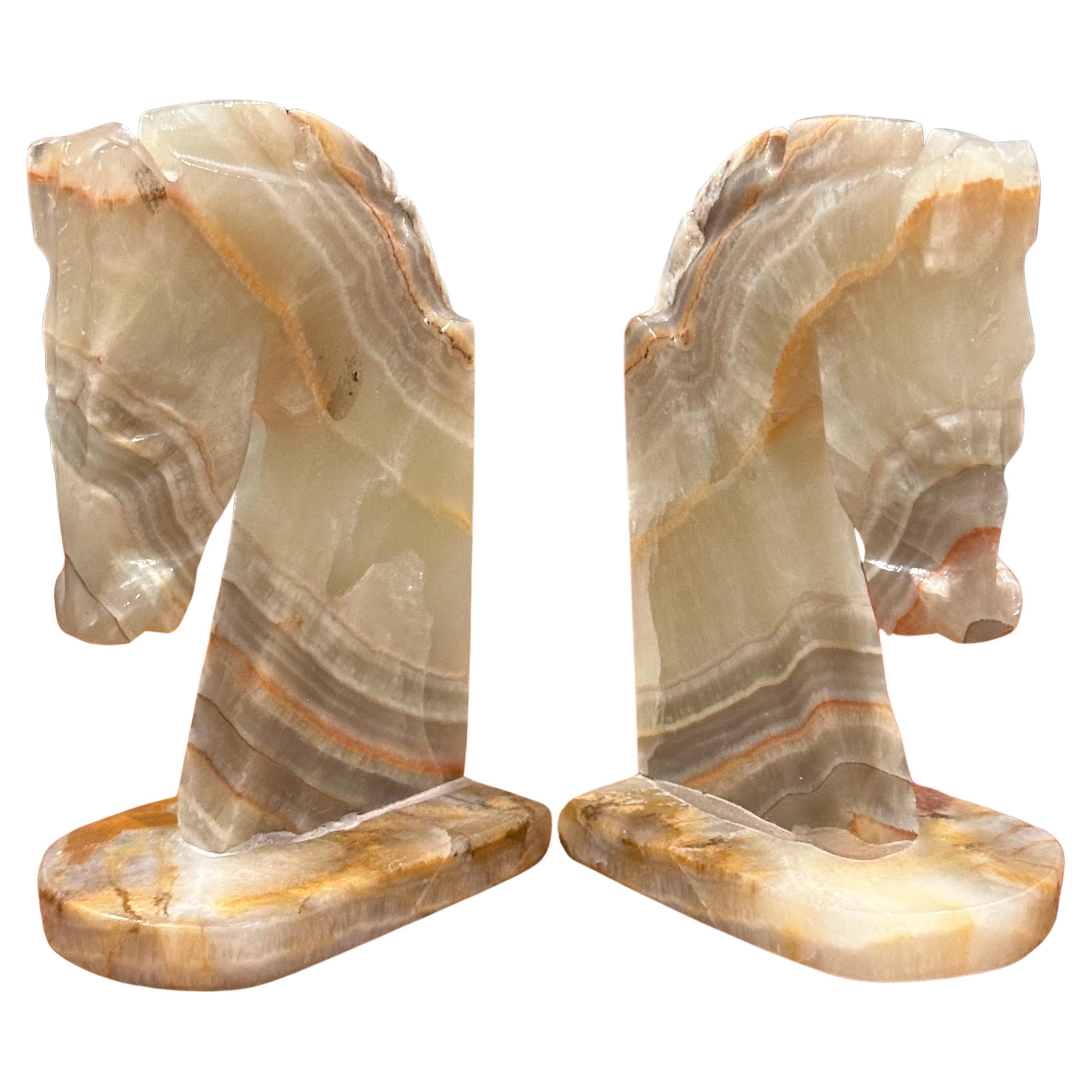 Very stylish pair of mid-century onyx horse head bookends, circa 1970s. The bookends are heavy and solid and well crafted. They measure 7.5