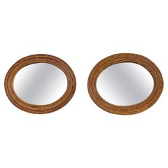 Pair of Mid Century Oval Pencil Reed Mirrors