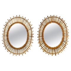 Pair of Mid-Century Oval Rattan Mirrors