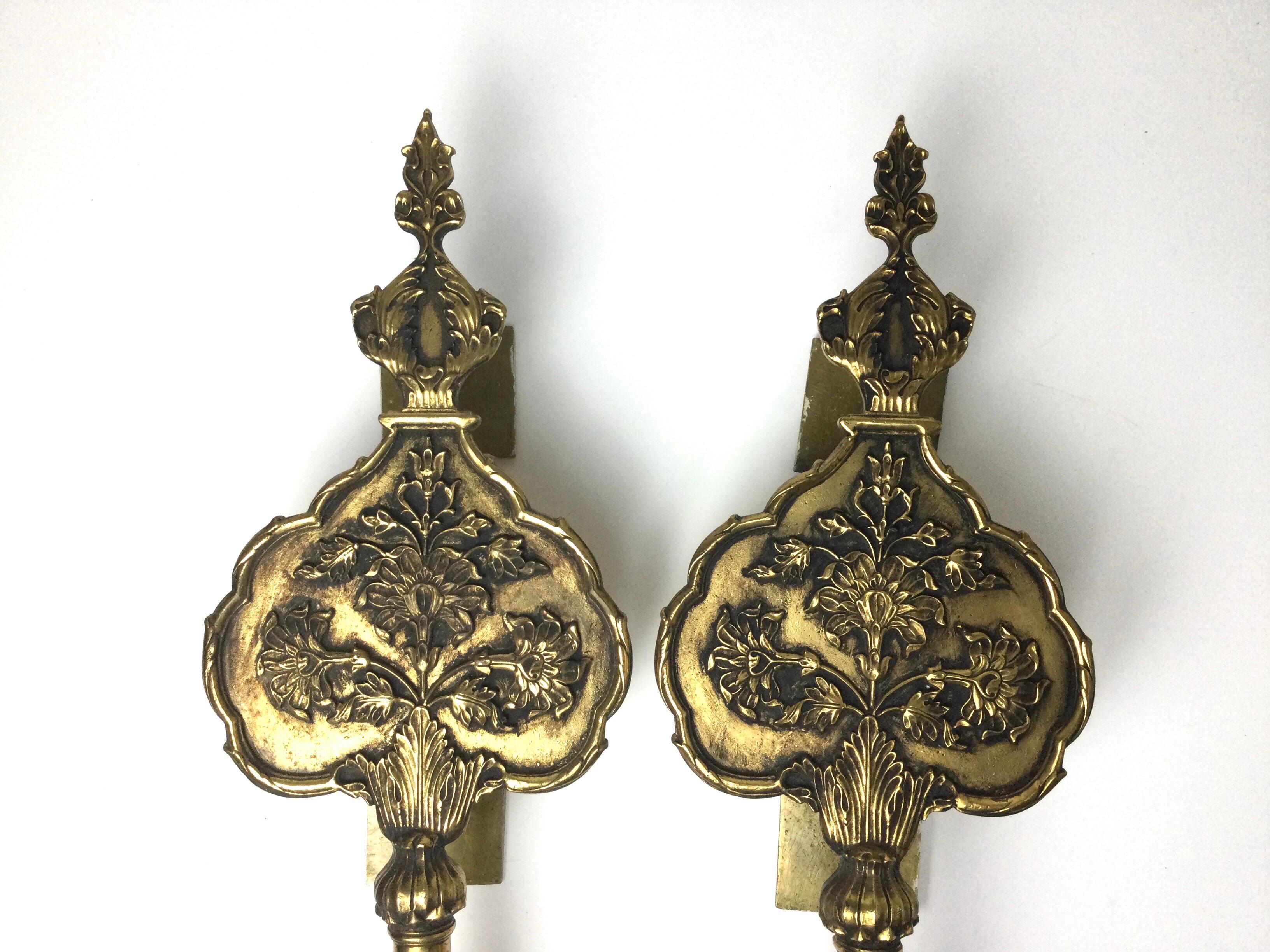 Pair of mid-century oversized 1950's brass door pulls. Came of a pair of double closet doors in a 1950's house that was beeping remodeled. 17 1/4