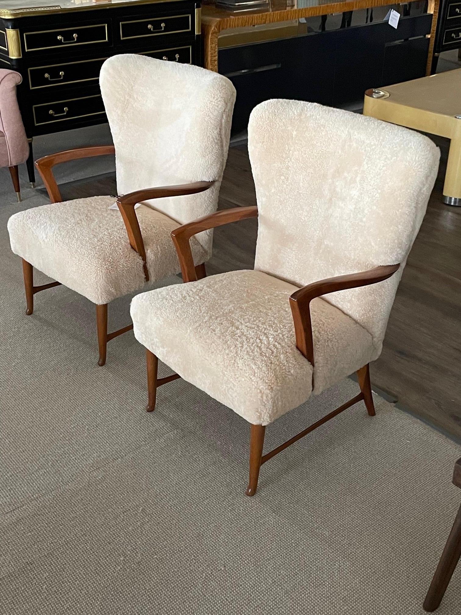 Pair of Mid-Century Paola Buffa Style Italian Lounge Chairs in Neutral Sheepskin

Pair of modernist Italian designer lounge chairs. Having an organic form in a genuine neutral sheepskin. 
Attributed to Paola Buffa, 20th century Italian architect and