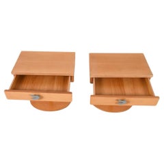 Pair of Mid Century pedestal base birch single drawer nightstands