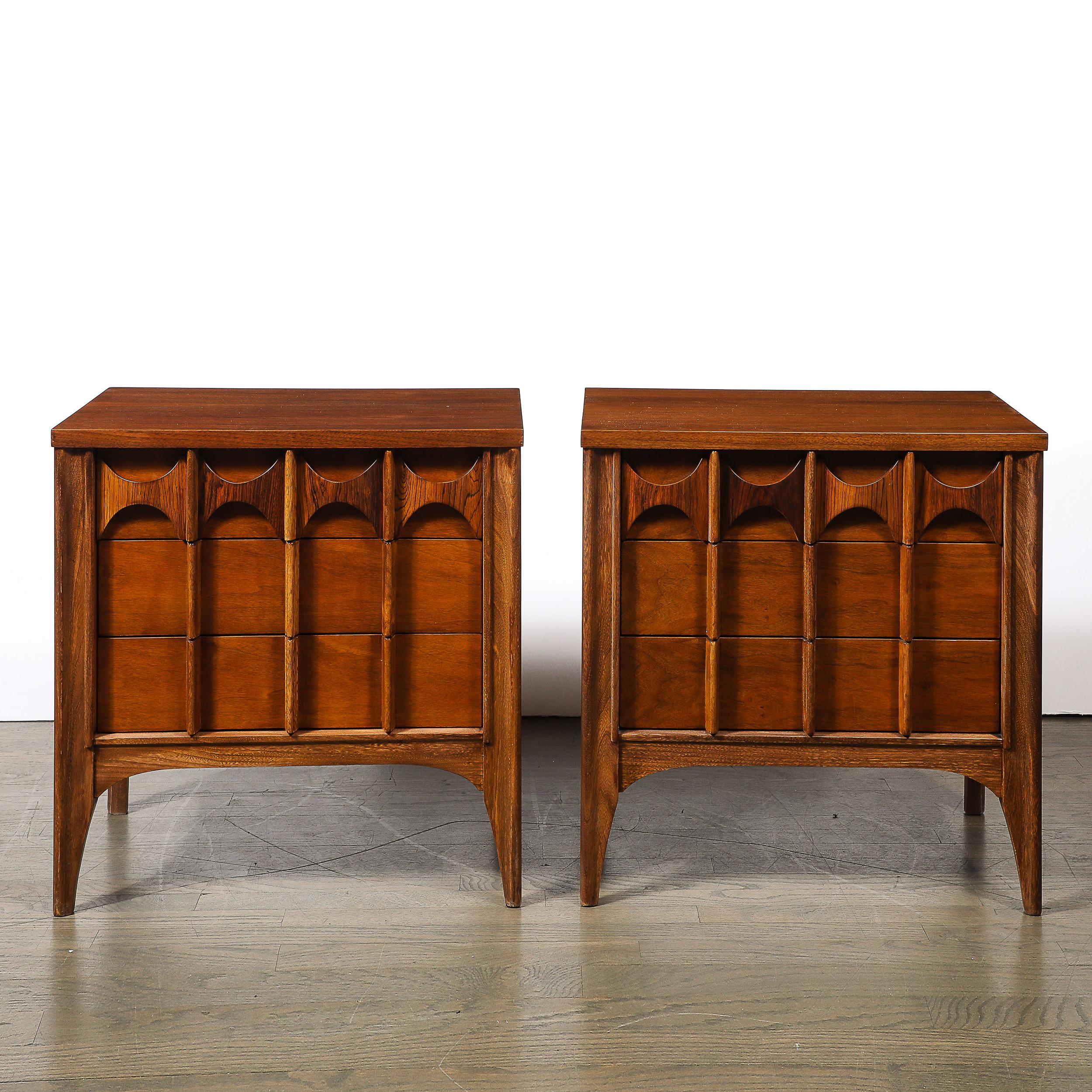 This elegant pair of Mid-Century Modernist Perspecta nightstands by Kent Coffey, hailing from America circa 1960, exemplifies the refined aesthetics and craftsmanship of the era. Known for his distinctive style, Kent Coffey's furniture pieces are