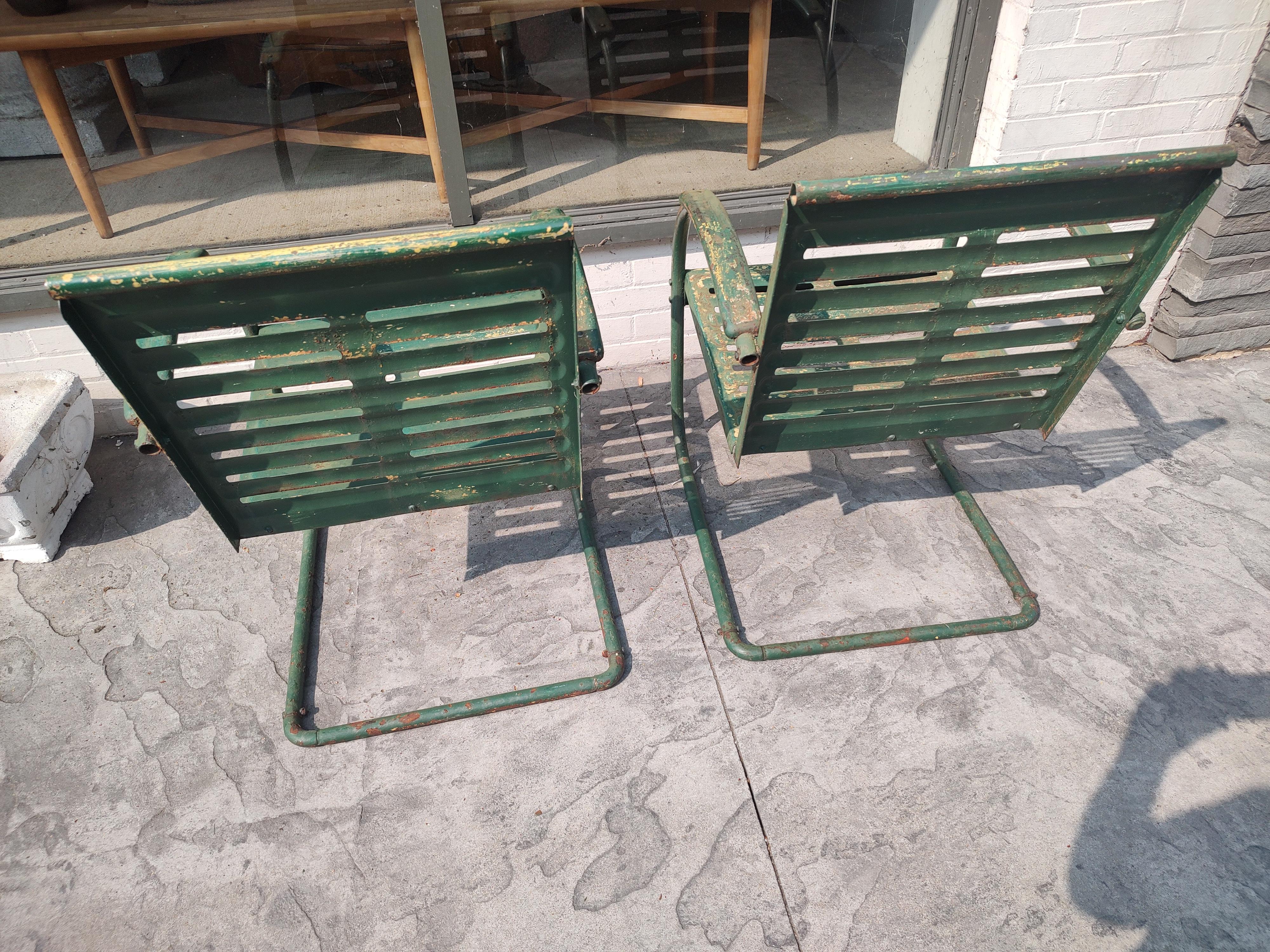 Pair of Midcentury Pierced Porch Bounce Chairs C1940 in Old Paint In Good Condition In Port Jervis, NY
