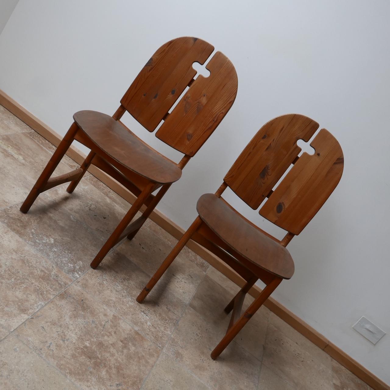 A pair of midcentury occasional chairs, ideal for a bedroom or hallway.

Formed mostly of pine with ply seat rests which could easily be covered in fabric.

Swedish, circa 1960s.

Good vintage condition and timeless form.

Dimensions: 47 W x