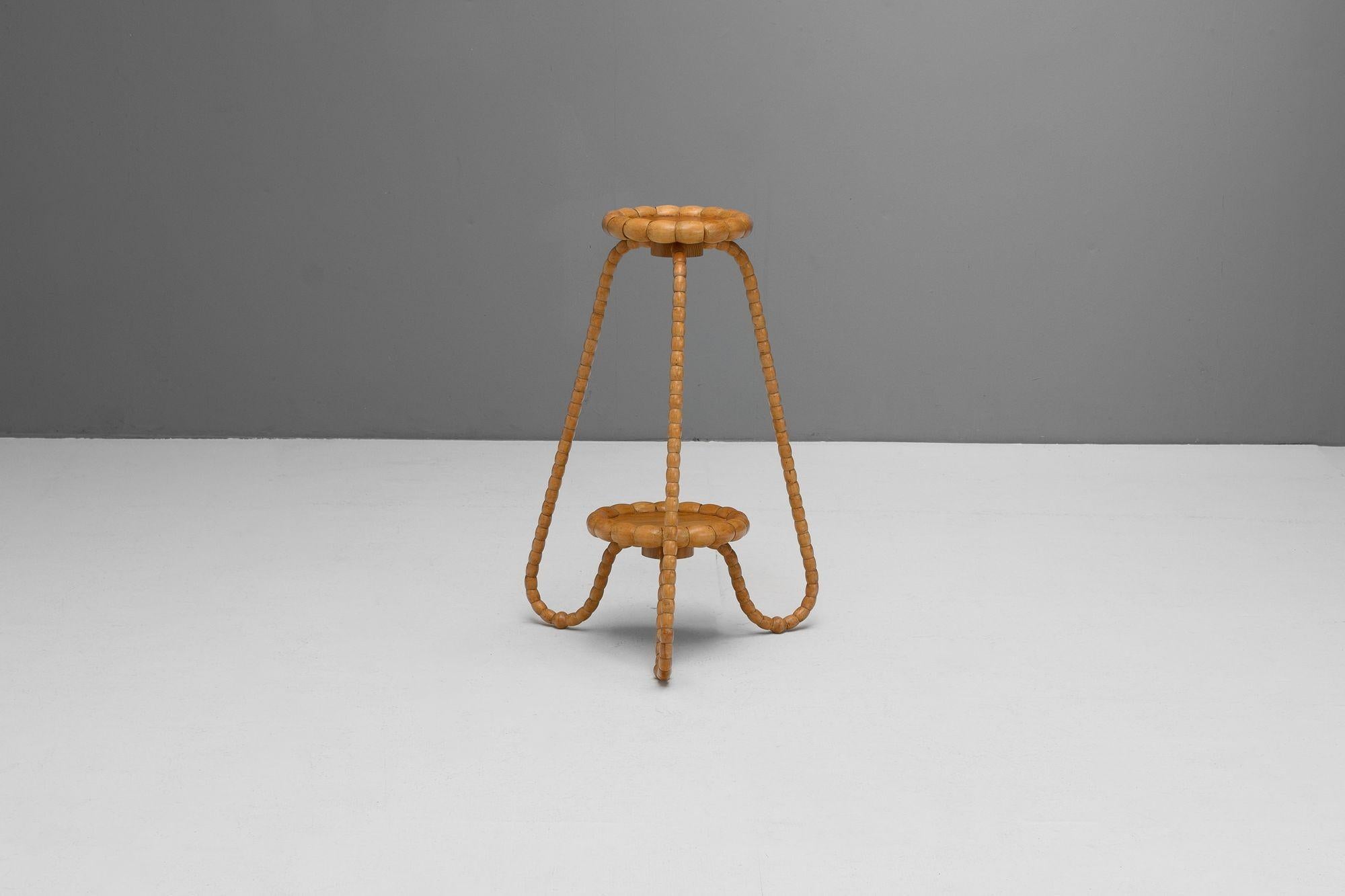 Pair of mid-century beech plant stands or side tables in a bobbin design. Re-finished. Sweden circa 1960.

H 69cm x W 43cm x D 43cm