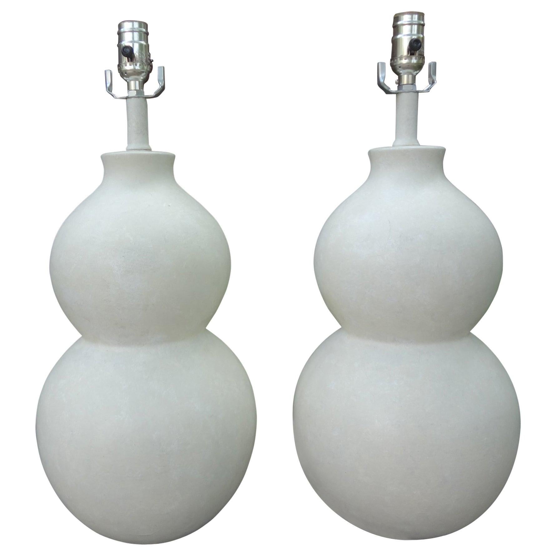 Stunning pair of Mid-Century Modern plastered gourd lamps. These Hollywood Regency gourd shaped lamps have a beautiful plaster finish and have been newly wired to U.S specifications with new sockets.