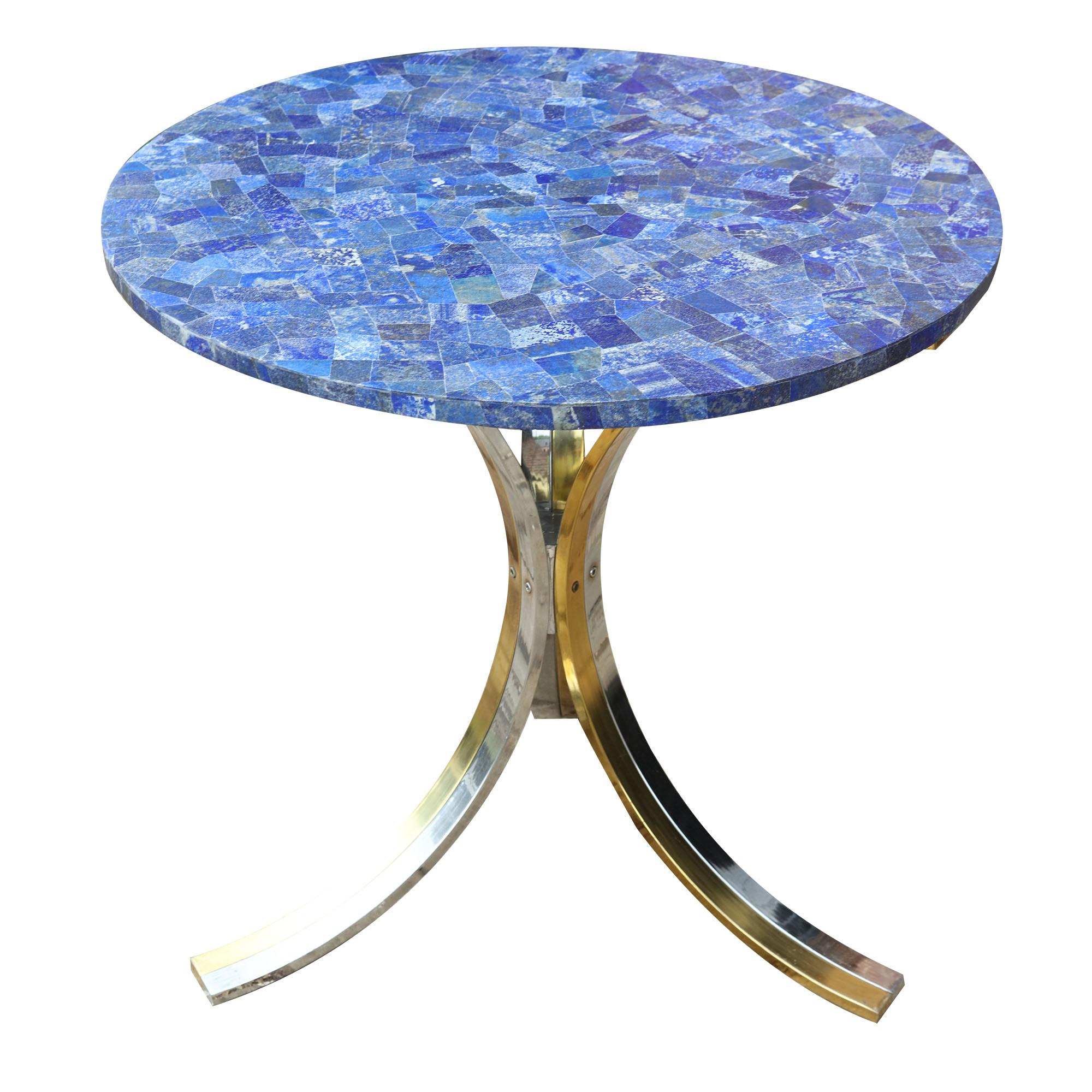 Glamorous pair of midcentury polished chrome and brass end tables attributed to Willy Rizzo, with associated lapis lazuli veneered circular tops.

France or Italy midcentury

Measures: Height 73cm
Diameter 76cm.