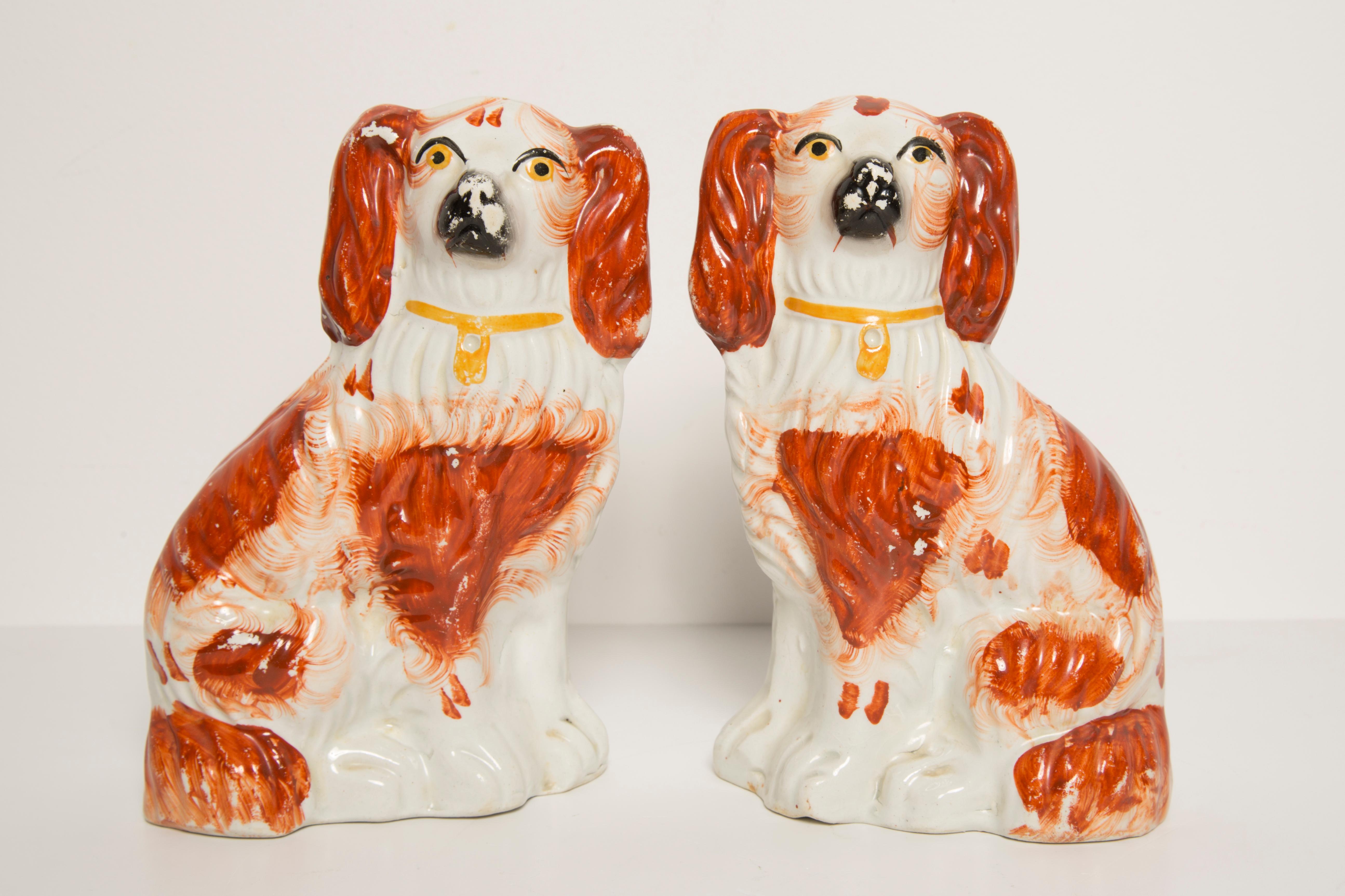 Painted ceramic, good original vintage condition. Beautiful and unique decorative sculptures. Spaniel Dogs Sculpture was produced in Staffordshire, England in 1960s. Only one pair of dogs are available.