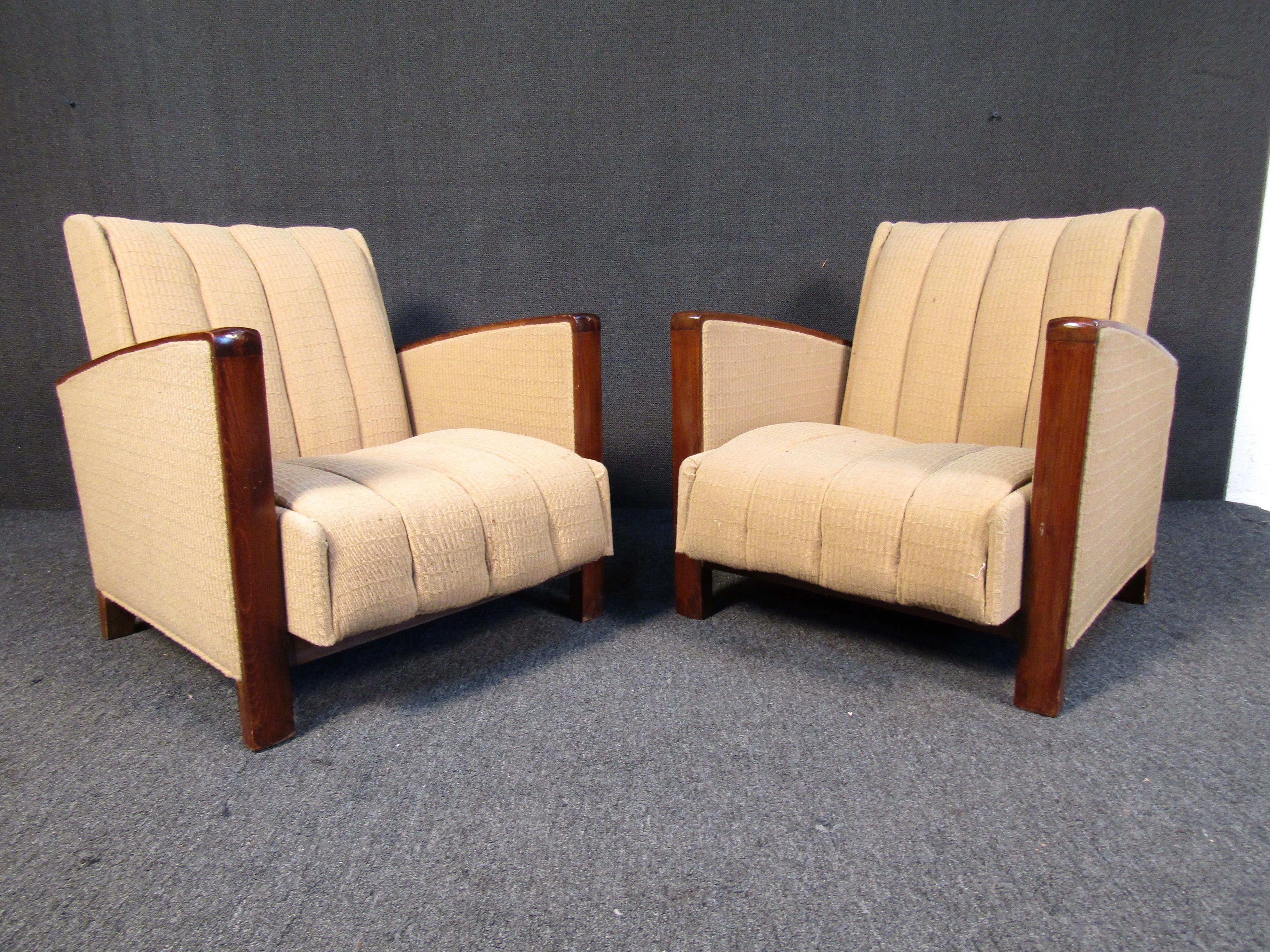 These line tufted mid century arm chairs feature a wooden base that slopes up forming comfortable armrests. The chairs do recline but only partially allowing the seat to move forward and back.
Please confirm item location (NY or NJ.).