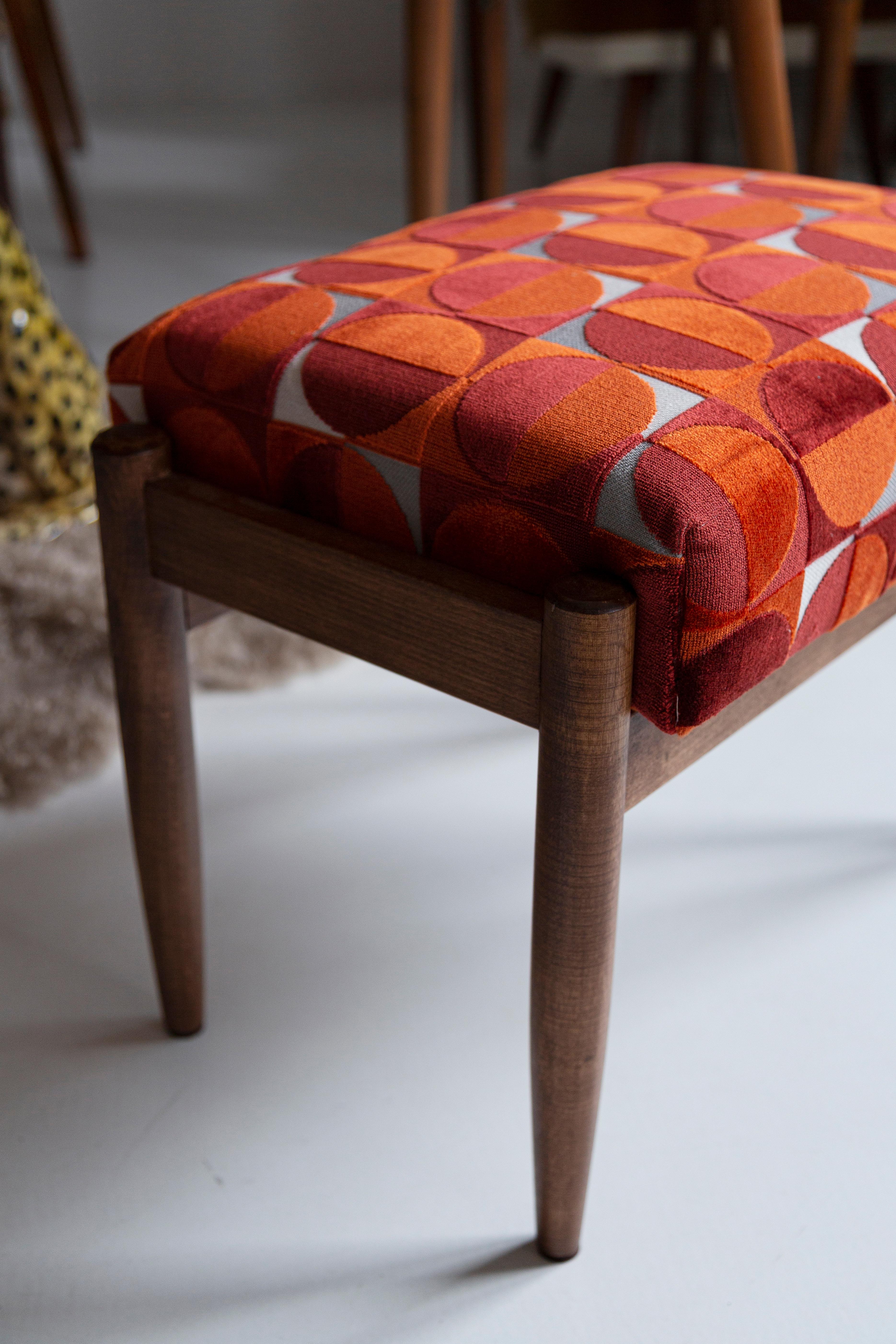 Stools from the turn of the 1960s. Beautiful red and orange high quality upholstery. The stools consists of an upholstered part, a seat and wooden legs narrowing downwards, characteristic of the 1960s style. We can prepare this stools also in
