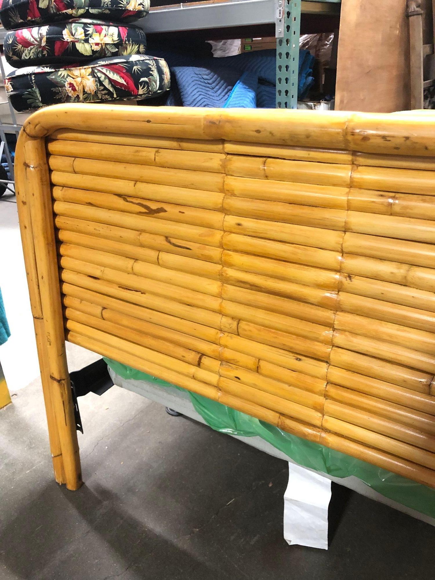 Pair of Mid-Century restored rattan beds. Each featuring a stacked headboard and foot board with a brand new Twin Ortho box spring mattress and mattress frame.

These headboards and foot boards are brand new from 1948 and haven't been