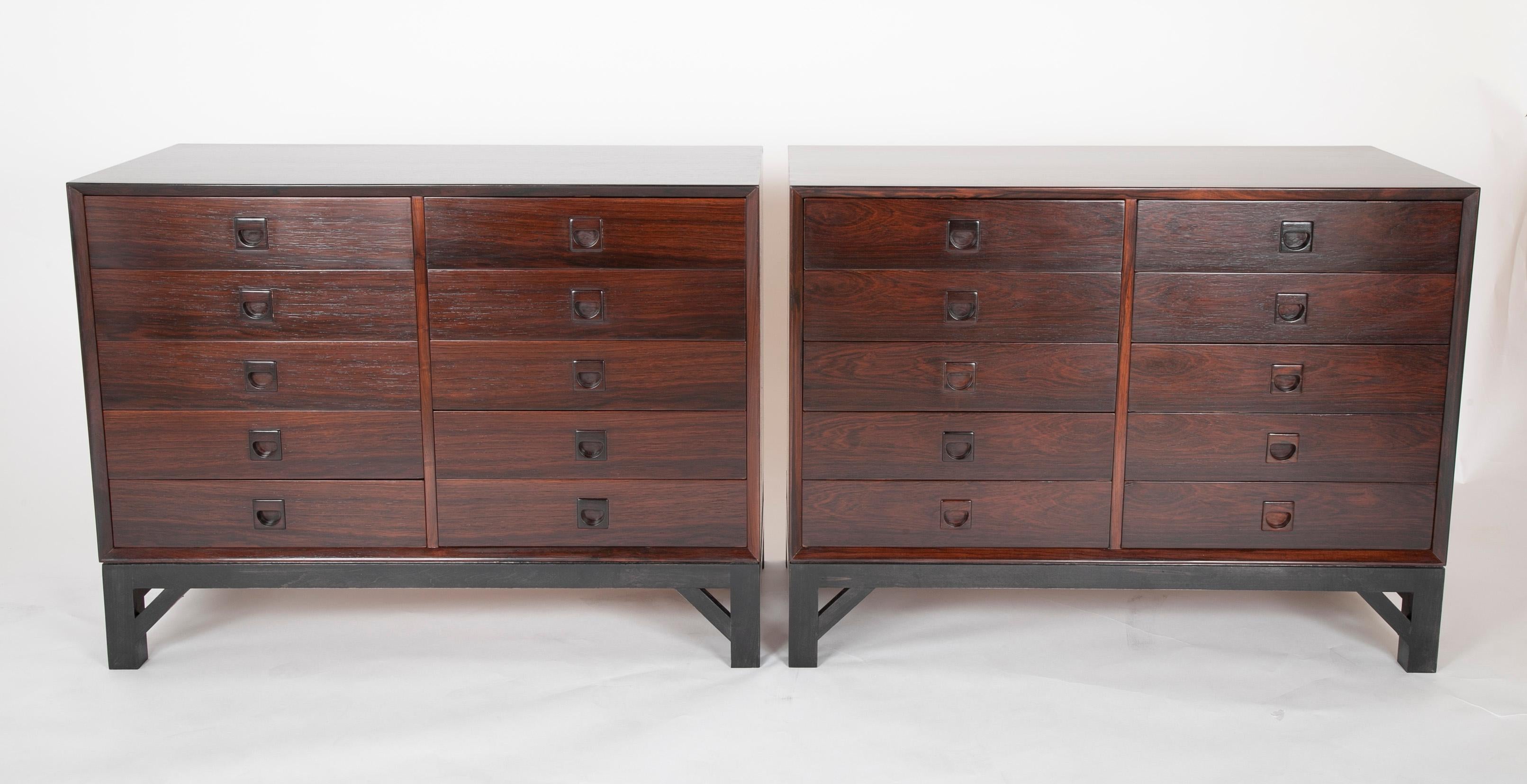 Pair of midcentury rosewood Danish five drawer chests on stands. In the manner of Svend Langkilde.