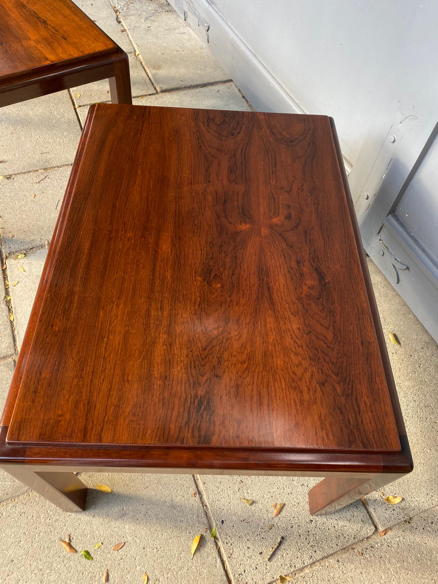Pair of Mid Century Rosewood Side / Sofa / End Tables, French, 1970s

A stunning pair of rosewood tables from the 1970s boasts an elegant design, perfect as end, side, or sofa table. Great proportions and size. Their sleek lines and rich, warm tones