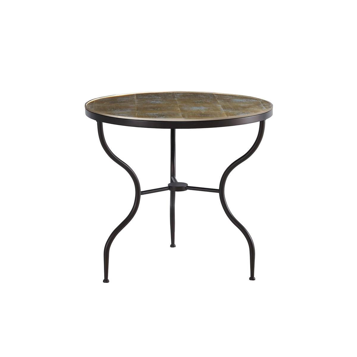 Mid-Century Round Eglomisé Side Table with a gold leaf detailed eglomisé round top having a brass trim edge above a three-legged wrought iron ebonized base.

Dimensions: 28