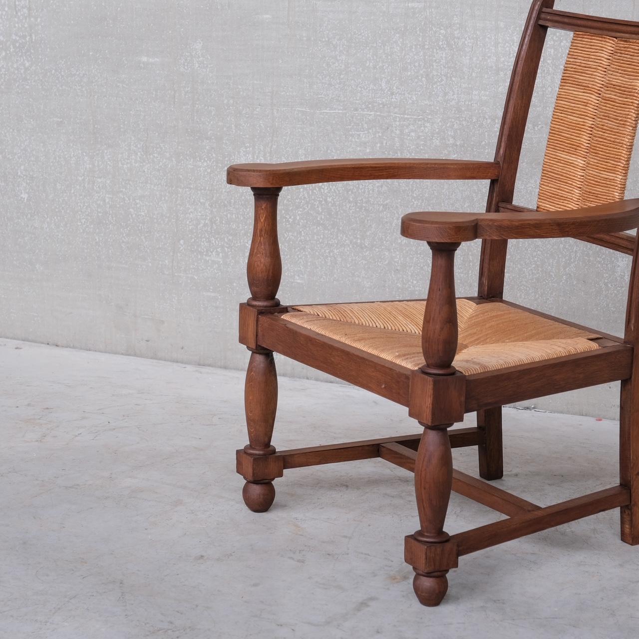 Paire de fauteuils français en jonc du milieu du siècle dernier en vente 2