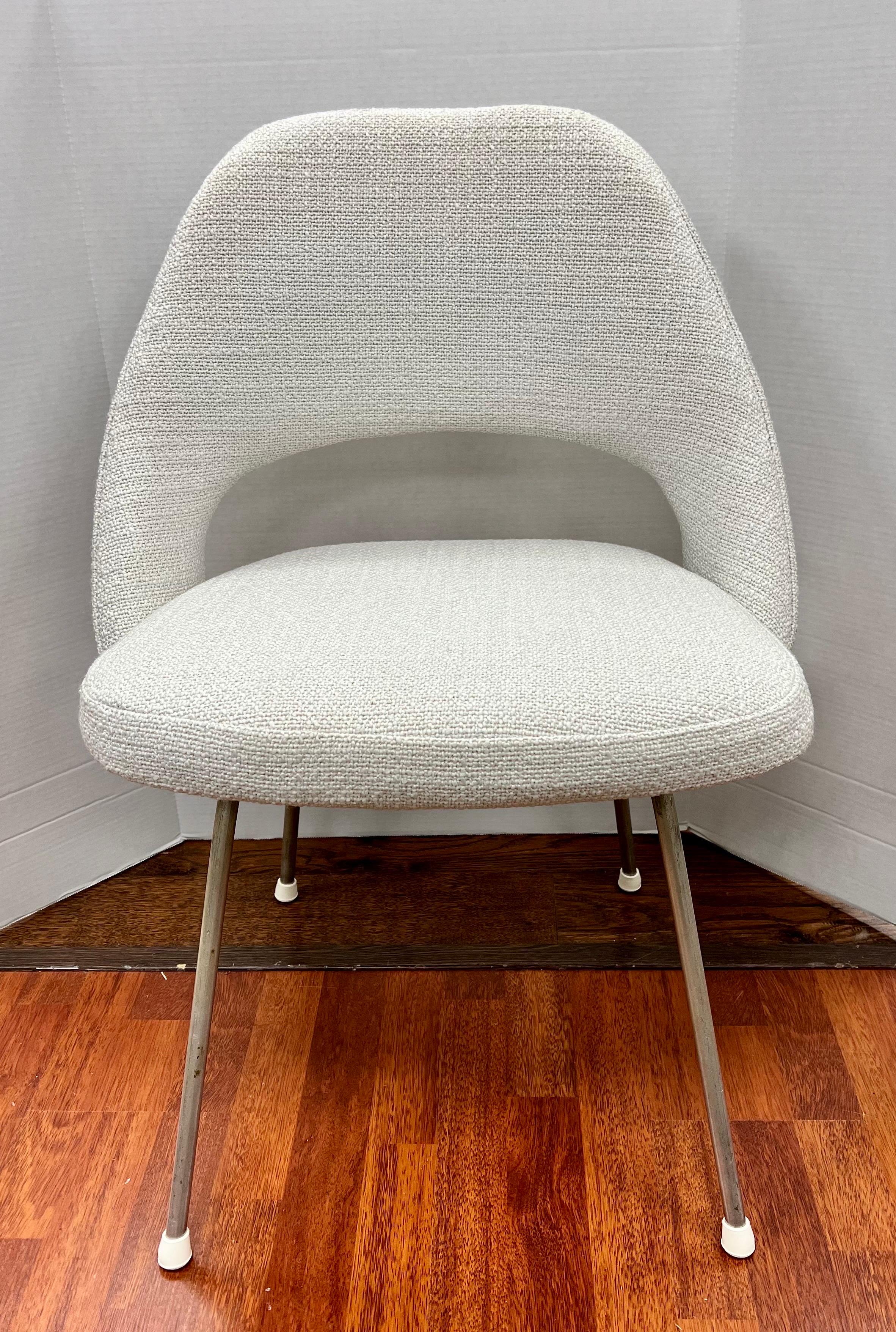 Designed by Eero Saarinen these chairs offer comfort in their form and cushioned upholstery. They are newly upholstered in a neutral woven fabric and rest on steel tubular legs. Why not own the best?