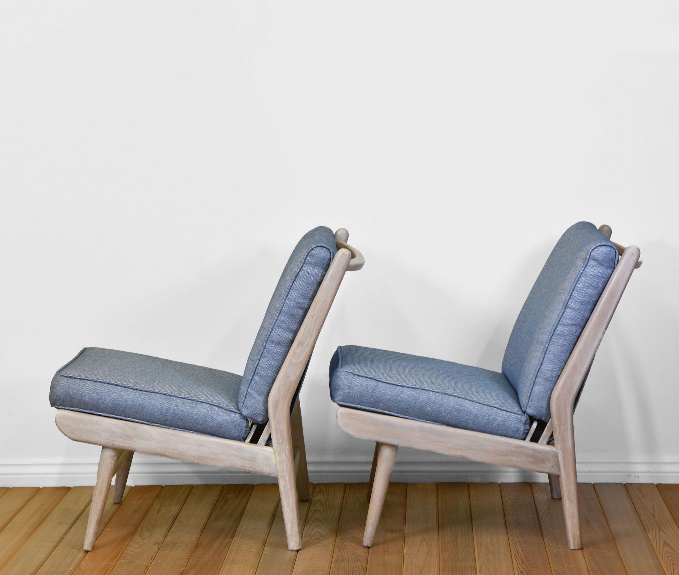 A pair of mid-century Scandart easy chairs. Circa 1960's.

Made by English company Scandart, based in High Wycombe, renowned for their designs based on Scandinavian style. 

The chairs are very comfortable. They are made in solid beechwood and elm