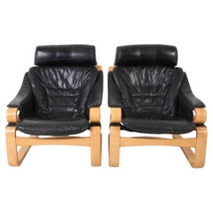 Pair of Mid Century Scandinavian modern Bentwood Black Leather Lounge chairs