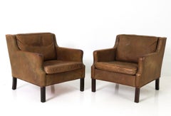 Pair of Mid Century Scandinavian modern Brown Leather Lounge chairs