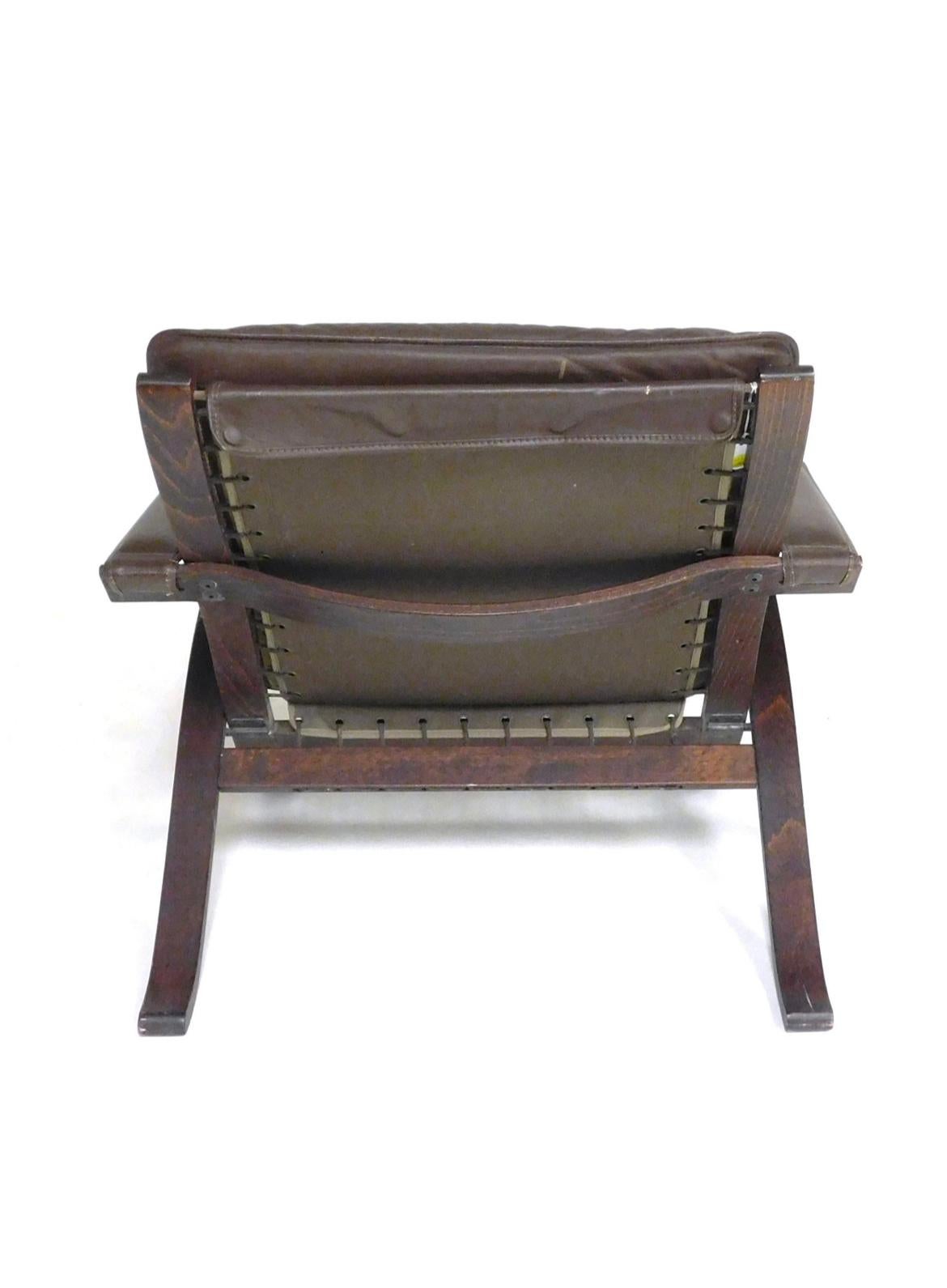 Norwegian Pair of Mid century Scandinavian modern brown leather Safari flex lounge chairs  For Sale