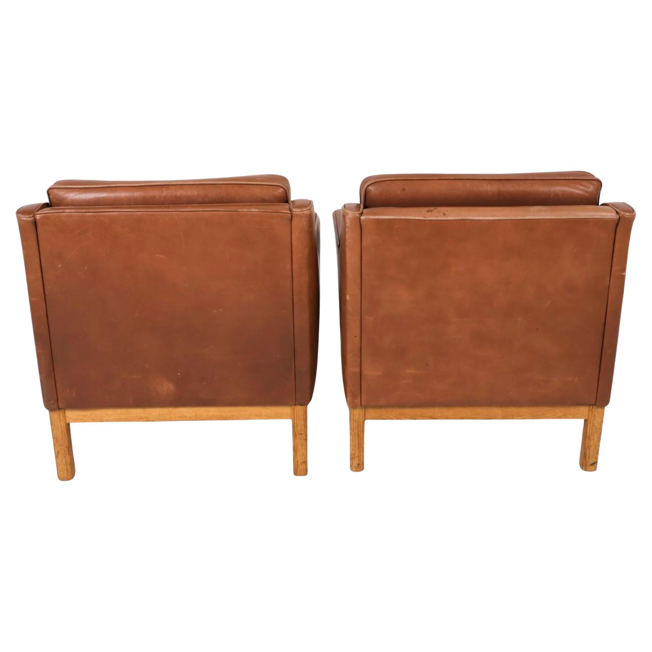 Scandinavian Modern Pair of Mid Century Scandinavian modern Brown Oak Leather Lounge chairs For Sale