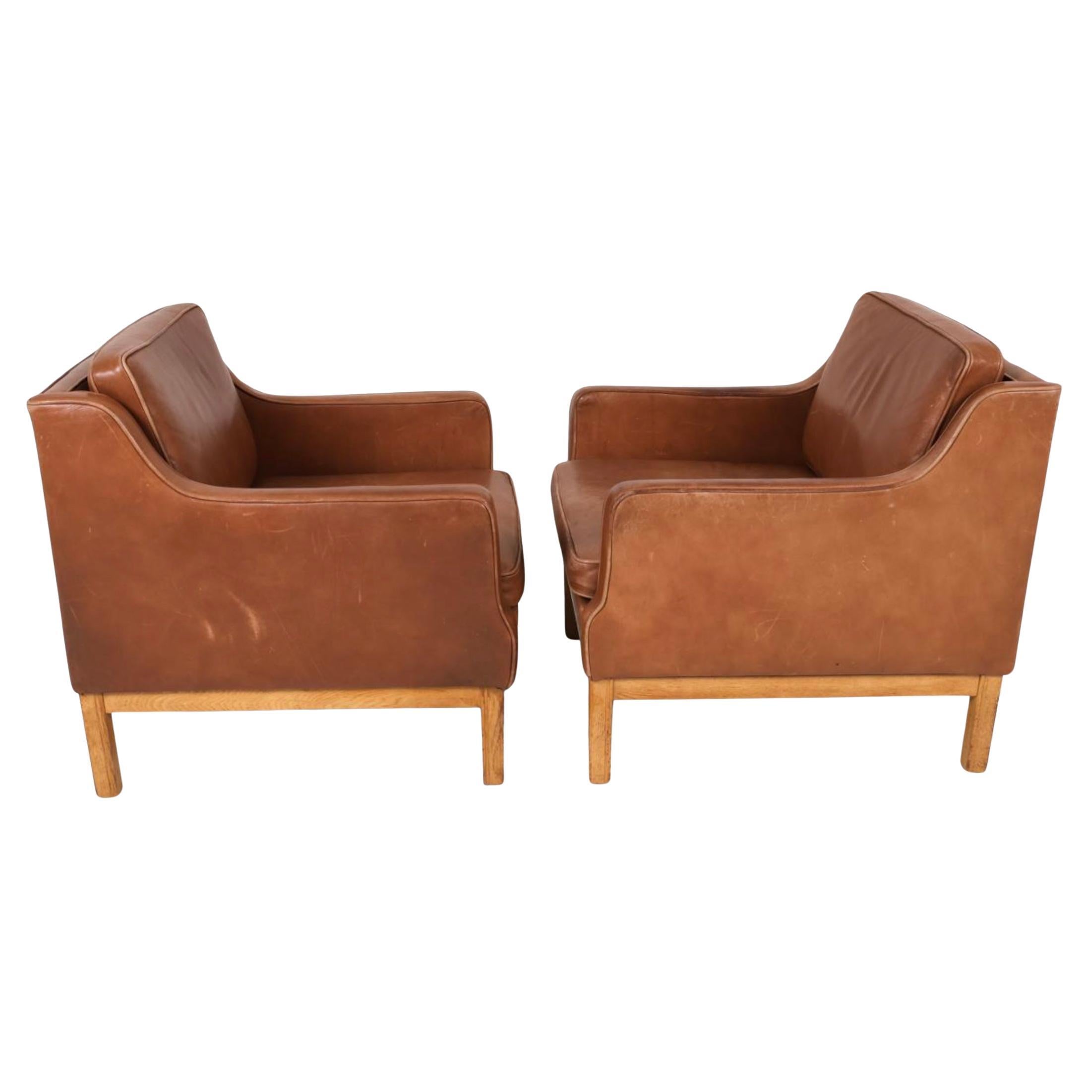 Danish Pair of Mid Century Scandinavian modern Brown Oak Leather Lounge chairs For Sale