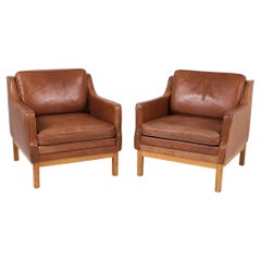 Pair of Mid Century Scandinavian modern Brown Oak Leather Lounge chairs