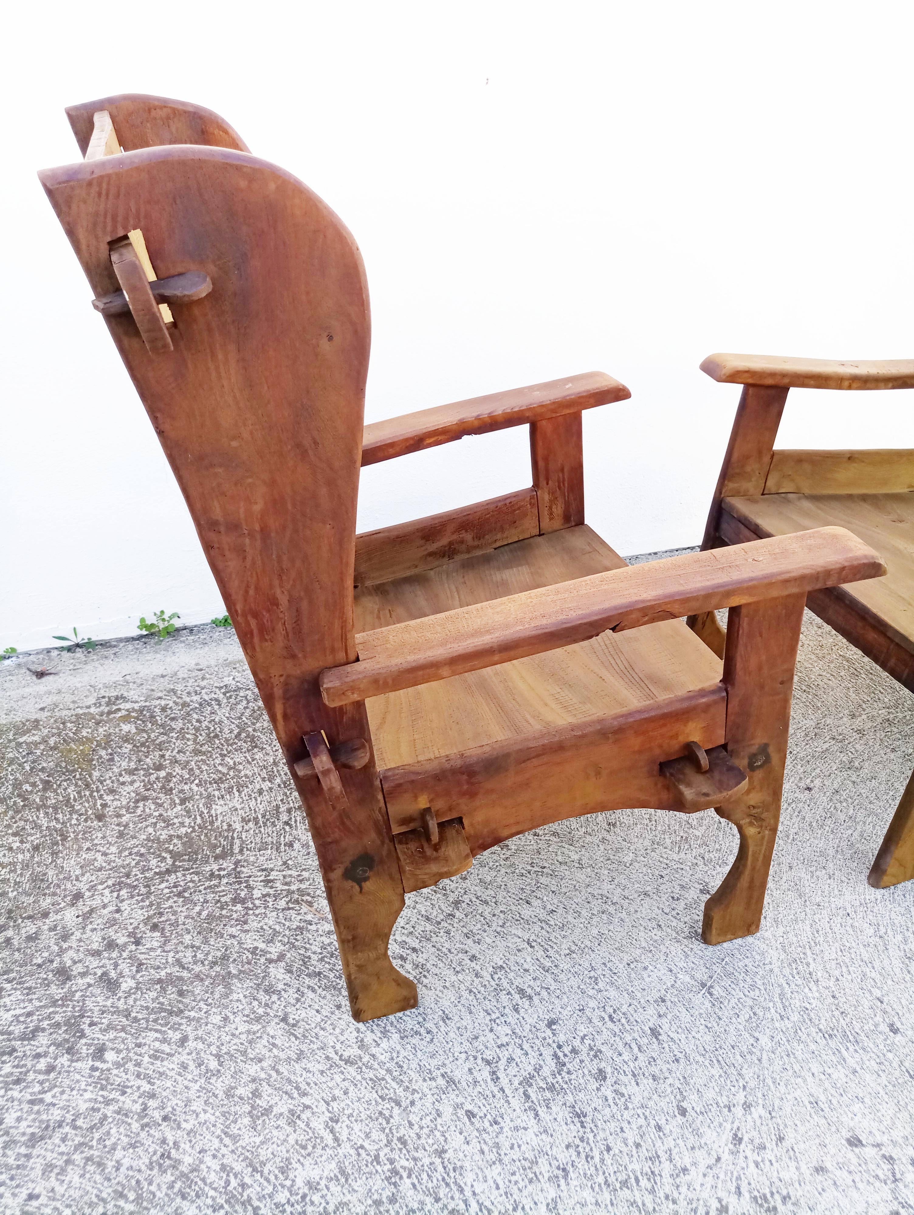 Rare pair of midcentury Scottish Brutalist wooden armchairs. In very good vintage condition.