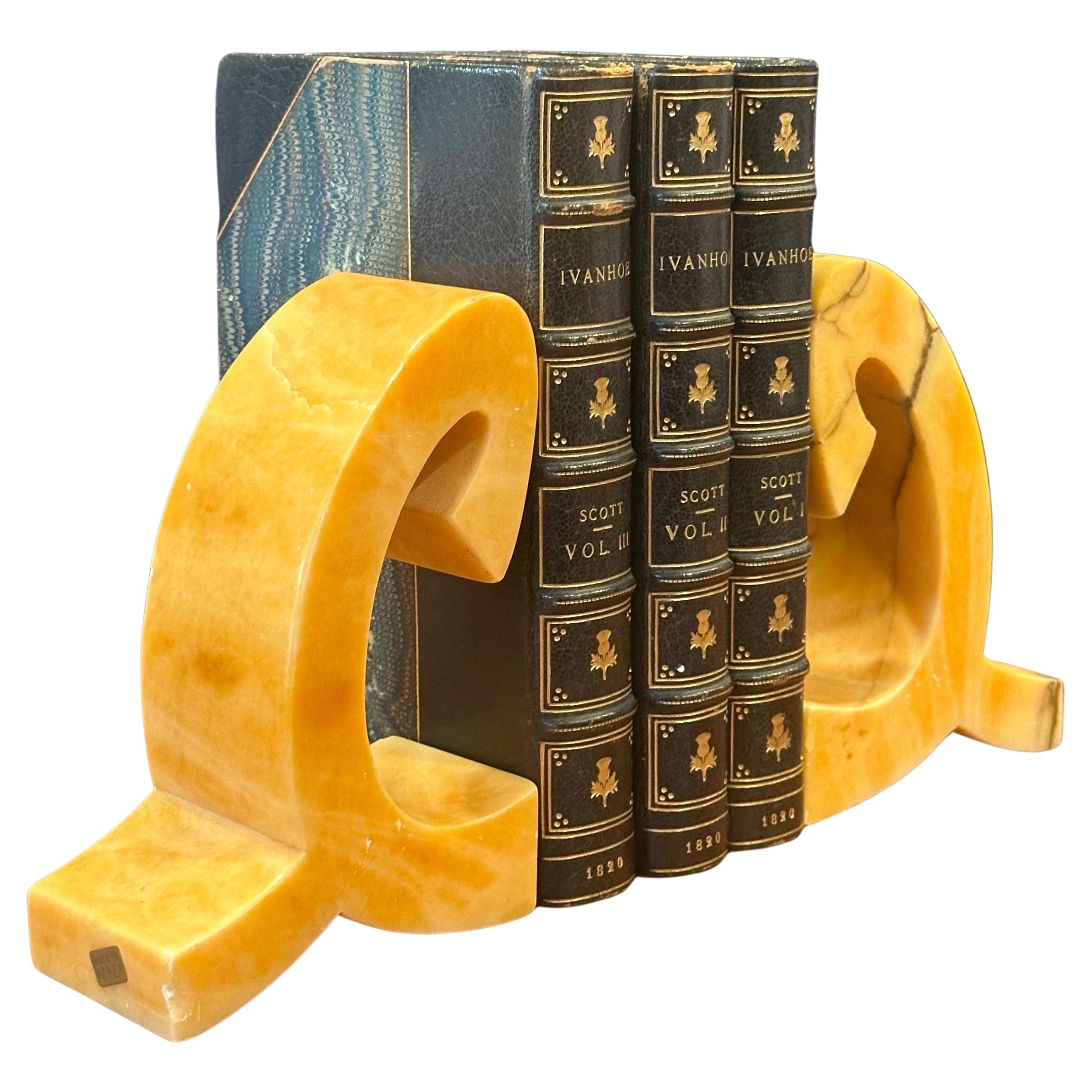 Very stylish pair of mid-century sculptural Italian marble bookends, circa 1960s. The bookends are heavy and solid and well crafted. They measure 8