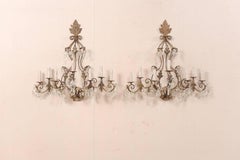 Pair of Mid-Century Seven-Light Crystal and Iron Sconces with Leaf Crest Tops