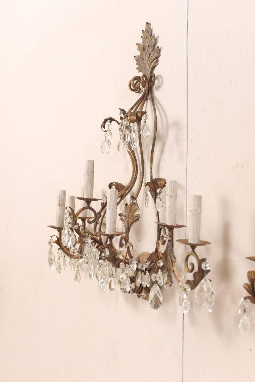 Metal Pair of Mid-Century Seven-Light Crystal and Iron Sconces with Leaf Crest Tops For Sale