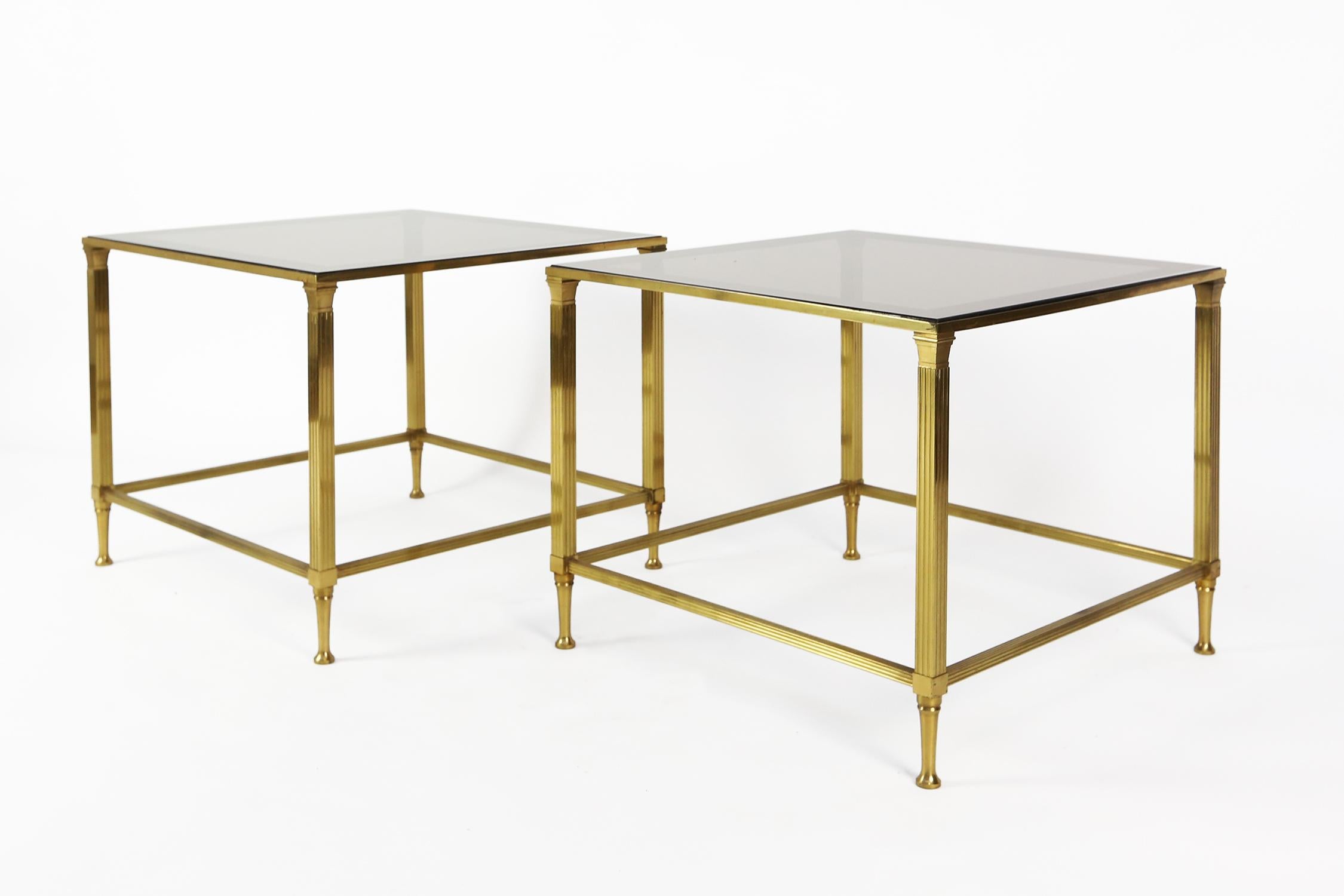 A fine pair of gilt bronze and aged mirrored glass side tables by Maison Jansen,
Paris
French, circa 1950.