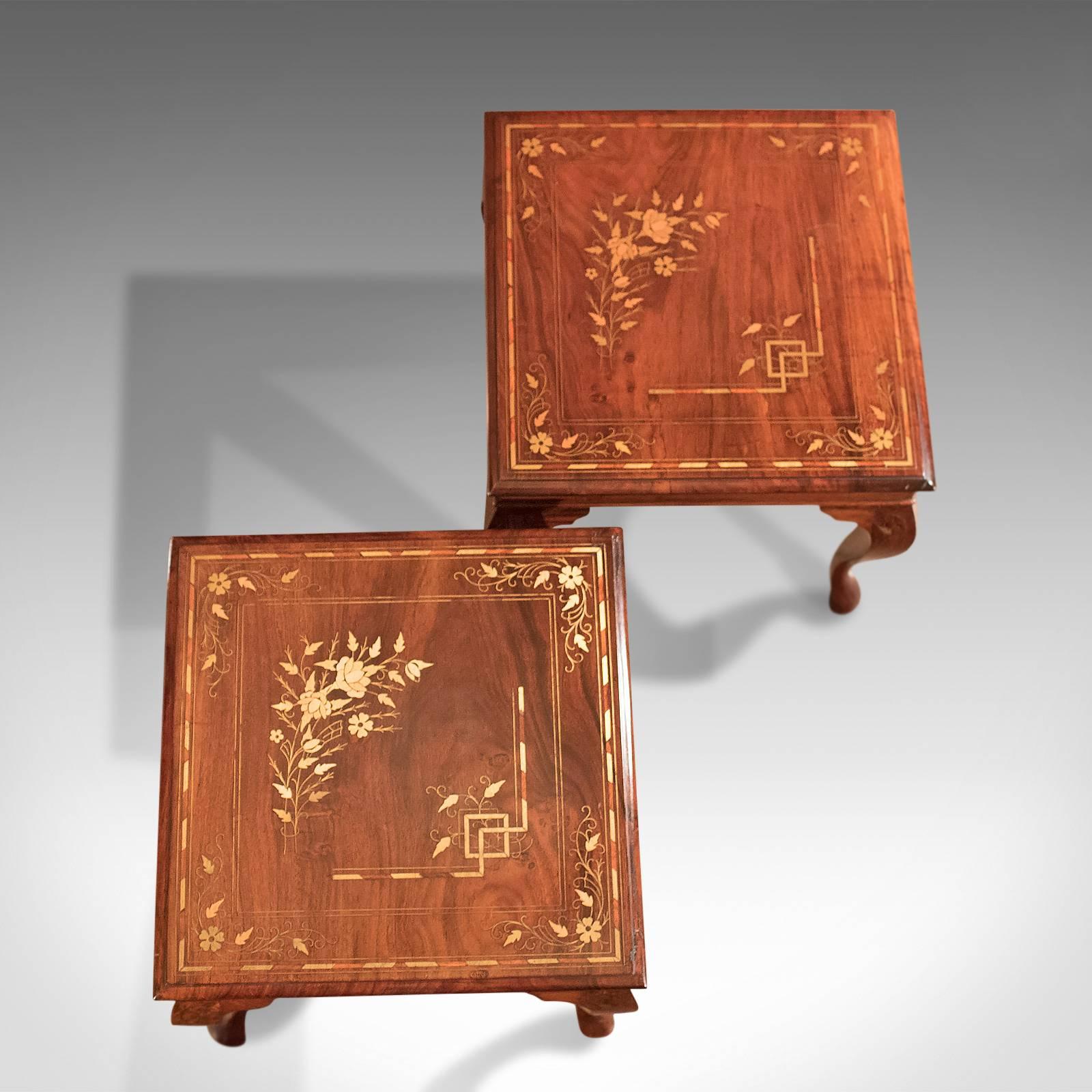 An attractive pair of side tables from the mid to late 20th century.

Crafted in choice cuts of Asian walnut
Stunning grain detail in the lustrous finish
Raised on cabriole legs with foliate brass inlay to knee
Frieze in good proportion with