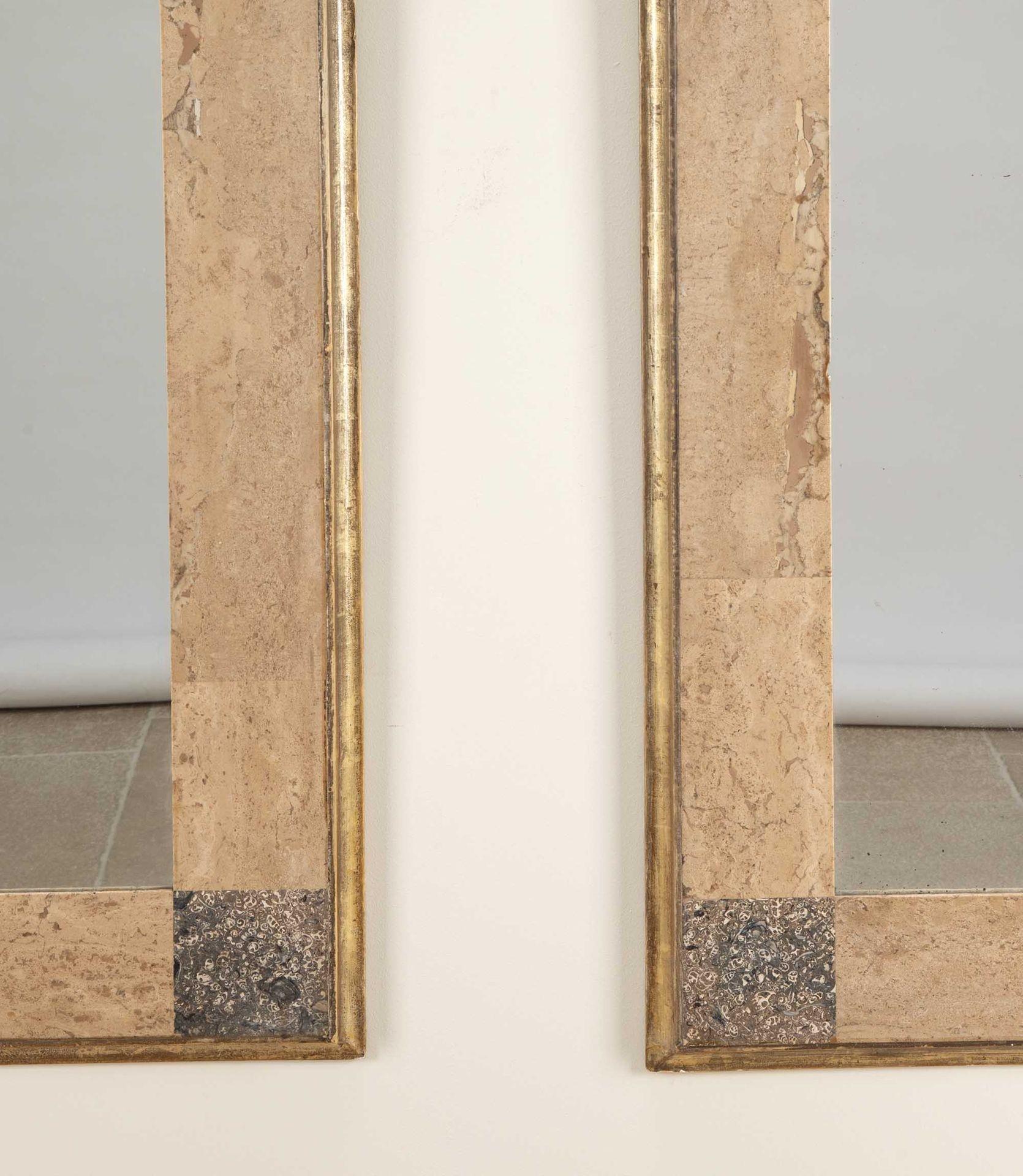A lovely pair of Mid-Century British Siena and fossil marble giltwood mirrors.
Circa 1970.