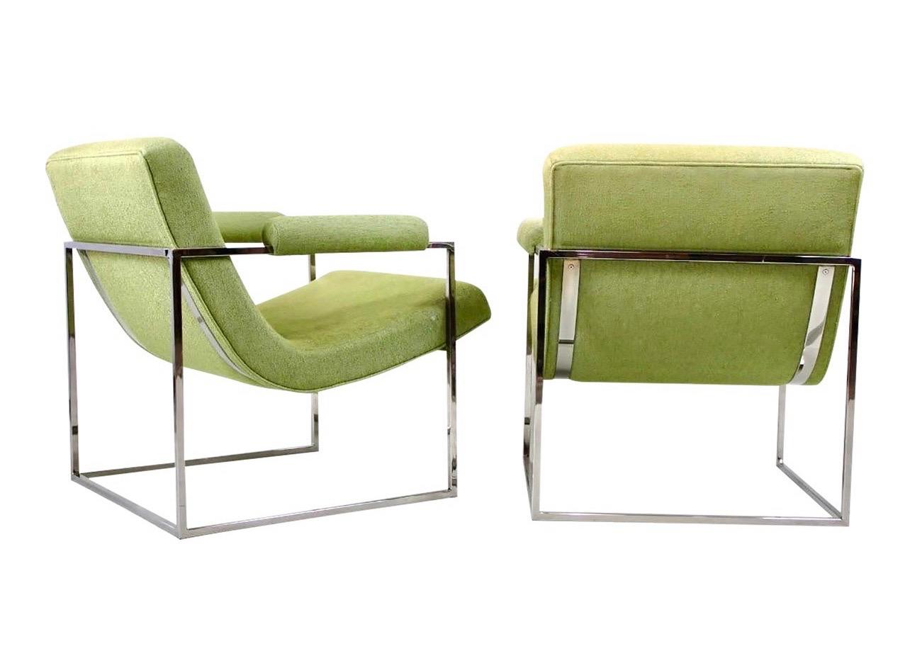 Coveted pair of matching Scoop Chairs designed by Milo Baughman for Thayer Coggin. Upholstered in a luxurious avocado green weave fabric. These chrome chairs have makers hallmarks as shown and will be some of the most comfortable chairs you have