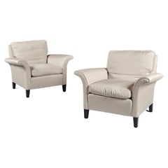 Pair of Mid-century Silk Upholstered and Ebonised Armchairs