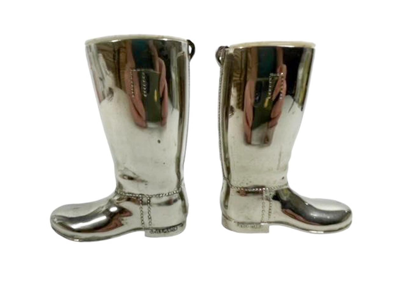 Pair of mid-century silver plate jiggers or spirit measures in the form of boots each with a different measure liner and marked on the heels 