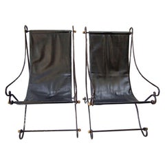 Paire de chaises longues en tissu du milieu du siècle dernier